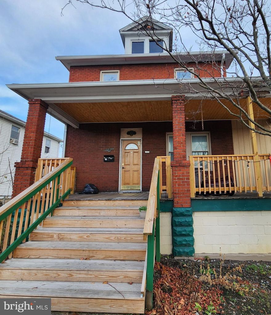 Lovely home with several updates including a fully remodeled bathroom, new flooring in the bedrooms, new roof and heating system. Other features include gorgeous hardwood floors in the living and dining rooms, plenty of oak cabinets in the kitchen, additional bath on the main level, walk up attic and fenced in rear yard.