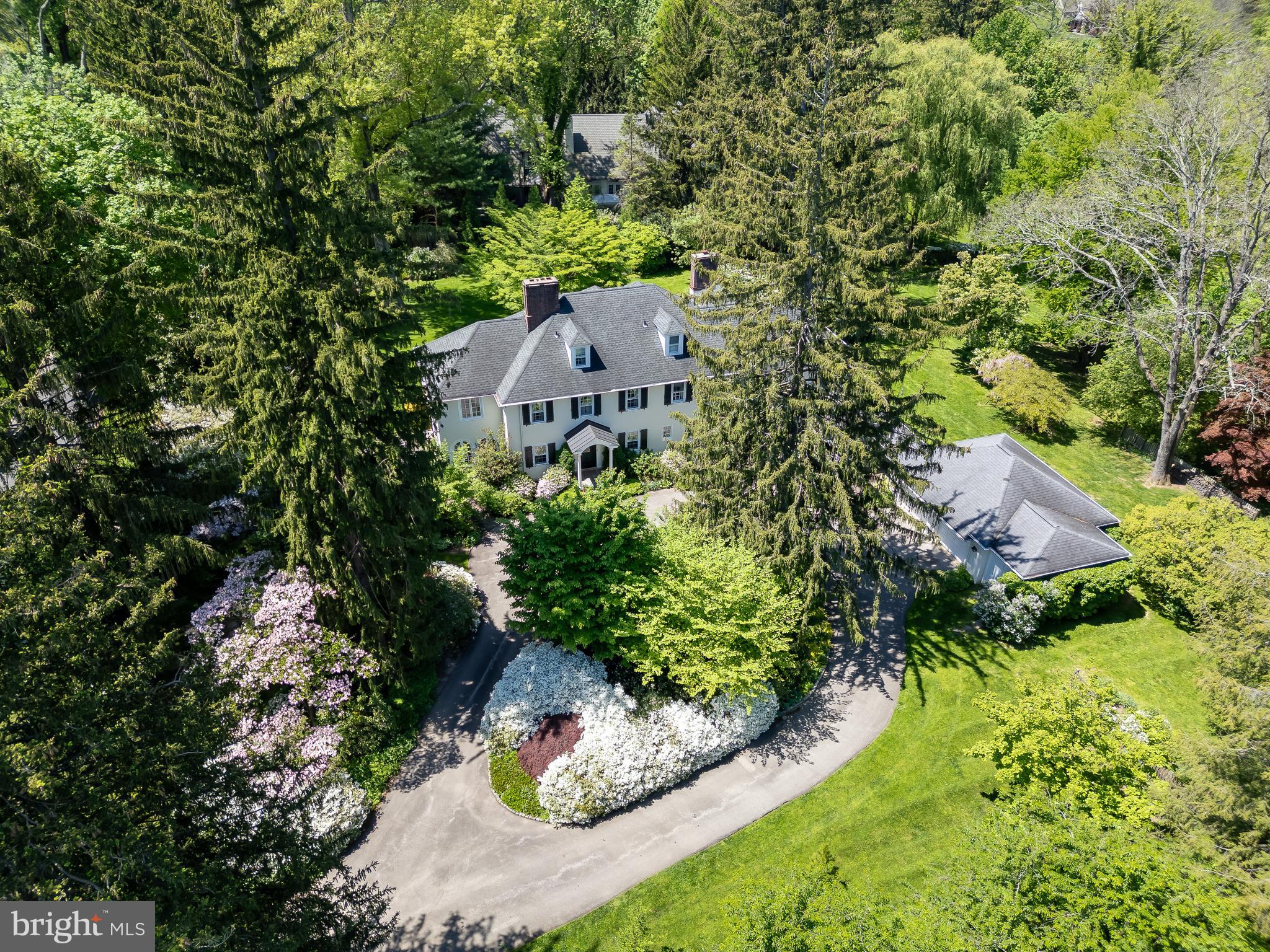 Welcome to 750 Harrison Road, Villanova, PA – The Perfect Family Home in the Heart of the Main Line
Tucked away on a quiet, tree-lined street in one of Villanova’s most sought-after neighborhoods, 750 Harrison Road offers the perfect blend of timeless elegance, modern updates, and family-friendly living. This beautifully maintained home sits on a spacious, level lot ideal for play, entertaining, and relaxation in your own private oasis. Inside find sun-drenched rooms, hardwood floors, and a flexible layout designed for everyday comfort and effortless entertaining. The front door opens to a large and welcoming entrance hall with fireplace adjoining a charming light-filled sunroom. The gracious living room with fireplace and large window alcove overlooks the flagstone patio and beautifully landscaped private back yard. The formal dining room has lovely millwork and French doors to the patio. The butler's pantry is complete with cabinetry for storage and a beverage fridge. Powder room. The open-concept kitchen is a true heart of the home, complete with white cabinets, and a generous island perfect for family meals or homework time. Adjacent is a casual dining area with desk, built-ins and entrance to back stairs. The large Family Room offers a warm, inviting space with much natural light, fireplace, built-in bookcases and double doors to the large flagstone patio spanning the length of the house. Upstairs, you’ll find four generously sized bedrooms, three full baths and a laundry/linen room. The serene primary suite has a lovely view of the rear yard and includes walk-in closet space, full tile bathroom, dressing room and a sleeping porch . On the third floor there are two bedrooms, a full bath and plenty of attic storage. The lower level is partially finished providing more room for a kids’ playroom, home gym, or media lounge.. There is also a full workshop, storage area and an outside entrance to the yard. Outside, enjoy a flat, private, landscaped fenced backyard ideal for summer barbecues, swing sets, and weekend soccer games. The additional gardens around the property are spectacular and well planned . .. something is always blooming! The two-car garage with additional storage space and wide circular driveway make coming and going a breeze.
Perfectly located in the award-winning Radnor School District and just minutes from top private schools, commuter rail stations, shopping, local parks, farmer's markets and great restaurants, this home truly checks every box for today's family living.
Come see why 750 Harrison Road is the Villanova address you’ve been waiting for.
There are two tax paracels for this property: 36-04-002240 and 36-04-02237-00