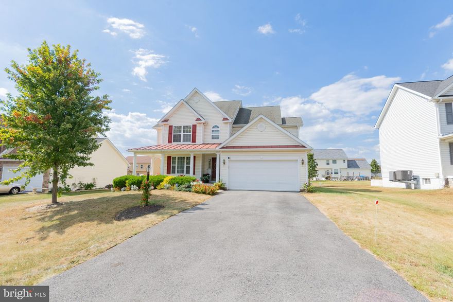 Welcome to this beautiful 4-bedroom, 2.5-bath Colonial located in the highly desirable Webber Springs community of South Berkeley! Situated on a 0.25-acre lot, this home offers the perfect blend of charm and functionality. Enjoy your morning coffee on the inviting wraparound front porch, then step inside to find a bright, open-concept kitchen and living room—ideal for entertaining—plus a designated dining room for more formal gatherings. The main-level laundry adds everyday convenience, while the fully finished basement provides extra living space for a rec room, home office, or gym. With generous closet space throughout and a thoughtful layout, this home checks all the boxes. Located in a commuter-friendly area with easy access to major routes, this is one you won’t want to miss!