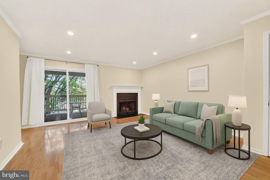 Spacious and well-kept, this 2-bedroom condo is located in the desirable Fountains at McLean community. The Oak model end-unit provides 1,050 sq. ft. on the second floor and includes two *deeded* reserved parking spaces (#197 and #198) just steps from the entrance. Residents will enjoy two private balconies (front and rear) as well as a separate storage closet.

Inside, the condo has been updated with recessed lighting, crown molding, fresh paint, newer carpet, and modern appliances. Wood floors flow through the livingroom and dining areas, and a wood-burning fireplace creates a warm focal point for the open layout.

The community’s prime Tysons location puts everything close at hand—Metro, Tysons Galleria, Harris Teeter, Wegmans, Whole Foods, and countless shops and restaurants are all nearby. Major commuter routes such as I-495, Route 66, Route 7, and the Dulles Toll Road (267) are also easily accessible.

Fountains at McLean residents enjoy amenities including a clubhouse, fitness center, sauna, seasonal pool, and onsite management.

Note: Photos are virtually staged.