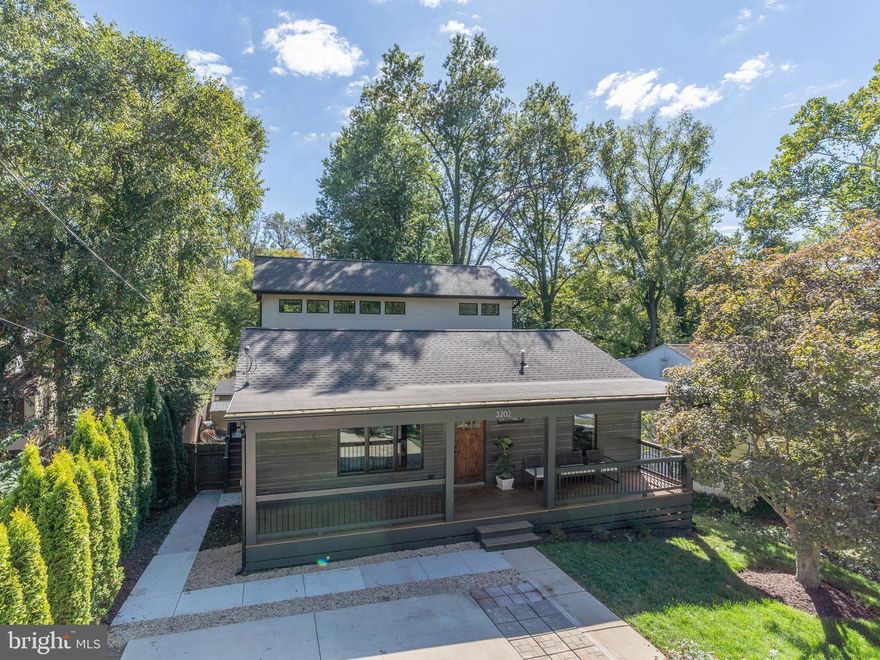 Coming Soon— A Reimagined, Expanded True Green Home Designed for Wellness, Sustainability, and Modern Living!

Symbi Homes does it again at 3202 Edgewood Road with another exceptional green renovation. Known for transforming homes into health-conscious, energy-efficient living spaces, this reimagined Mid-Century Modern blends thoughtful design, high-performance building, and flexible modern living.

The home offers five bedrooms, three bathrooms, and just under 3,300 square feet of finished living space, including a detached studio. The transformation thoughtfully blends preserved architectural elements with extensive modern upgrades, including a new roof, systems, appliances, and finishes throughout. Every space has been carefully redesigned to support beauty, functionality, and well-being.

From the moment you arrive, the home’s curb appeal makes a statement. Clean modern lines, a welcoming front porch, and the striking exterior of Energy Star aluminum-clad wood windows paired with TimberHue wood-look lap siding by James Hardie define its modern aesthetic. This home is only the second in the nation to feature durable TimberHue ahead of its Spring 2026 release, shown here in Weathered Oak for an authentic wood-inspired finish that complements the home’s Mid-Century character.

When you enter the home, you’re welcomed into a versatile front living space that can serve as a greeting area, dining room, or comfortable sitting room. From there, your eyes are immediately drawn to the striking three-level rear addition, where soaring ceilings and expansive windows flood the kitchen and family room with natural light, creating an open and airy atmosphere.

Anchored by a chef’s kitchen with a full island and bar seating, this space becomes the true heart of the home — ideal for both everyday living and entertaining. Just off the kitchen, step onto the spacious side balcony, large enough for seating and grilling, offering a seamless extension of the indoor living area and a perfect place to enjoy morning coffee or evening gatherings.

This level also features two bedrooms and a full bath, along with a thoughtfully designed mud room that supports everyday organization and functionality.

Upstairs, the newly added primary suite isn’t just a bedroom — it’s a private retreat. The space features soaring ceilings highlighted by a beautiful exposed wood beam spanning across the room, along with a spa-like bath, a private balcony, a large walk-in closet, and a small attached bonus room that can be used as an office or cozy sitting area. It is truly your own personal haven.

The lower level, with its own entrance, includes two bedrooms, a full bath, kitchenette, recreation room, and laundry, creating an ideal space for guests, multigenerational living, or potential rental income. From this level, step outside to a private patio, offering another outdoor space for relaxing or entertaining.

A detached backyard studio adds even more flexibility, whether used as a gym, home office, or creative studio, all while offering privacy just steps from the main home.

This home showcases Symbi Homes’ signature approach to health and sustainability, featuring:

All-new high-efficiency heat pump HVAC and water heating
PV-ready infrastructure for future solar and EV charging
Upgraded smart electric panel with energy monitoring
Beyond-code insulation and air sealing
Green-certified, sustainable materials
Intuitive smart home automation

This home will also be certified Zero Energy Ready by the U.S. Department of Energy — a rare achievement reached by fewer than 1% of new homes and remodeling projects each year.

Nestled in the Homewood neighborhood of Kensington, a quiet, tree-lined community known for its walkability and charm, you’ll enjoy easy access to parks, playgrounds, and the Saturday farmers market. Stroll to The Dish & Dram for a cozy meal or grab a slice at Continental Pizza, along with other local restaurants. Plus, the Kens