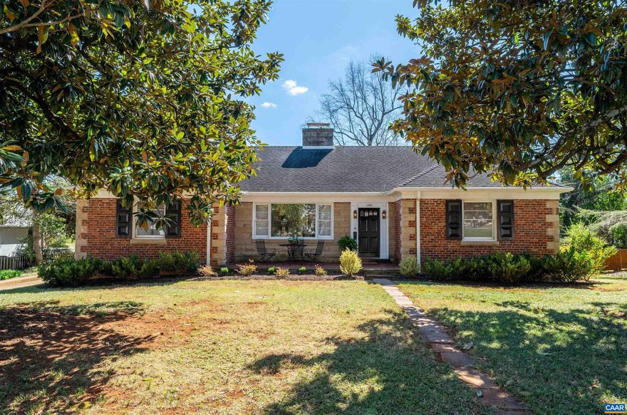 This distinguished residence features elegant hardwood floors, refined plaster moldings in the living and dining rooms, built-in shelving and cabinetry, a marble hearth, and stainless steel kitchen countertops. Interior boasts 5 spacious bedrooms, 3 full baths, expansive family rooms on both levels, and a generous dining room. Full finished, walk-out basement, charming potting room/greenhouse, floored walk-up attic, detached two car garage w/workshop, and storage shed. Prime location near UVA and downtown, with convenient access to Routes 250 and 64.,Stainless Steel Counter,White Cabinets,Fireplace in Basement,Fireplace in Living Room