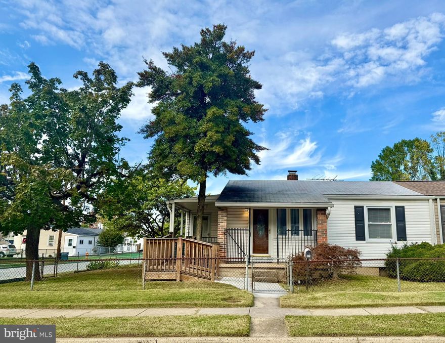 This Home has a Cozy Cottage Vibe. It has been well-kept. It features new windows and 2 covered porches.   It is situated on a corner lot with a spacious yard completely fenced.  It is one floor, easy living, and an eat-in kitchen as well. There is a Handicap ramp for easy access to the home. The basement offers plenty of storage. This home is within walking distance of a grocery store and public transportation.