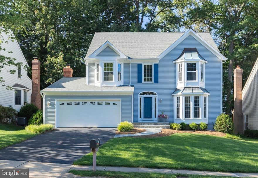 Beautiful home in the highly sought after Crosspointe neighborhood! This open concept beauty has three levels of living space! 4 Bedrooms & 3.5 Baths. Gorgeous curb appeal with new Flagstone/Bluestone walkway and front stairs (fall 2020). 4 bay windows adding tons of natural light. Dramatic 2 story foyer, atrium window and hardwood floors. New Carpet, Paint and Light fixtures (2023). To the right a large light filled living room with a bay window. Separate dining room also with a bay window and crown molding. Kitchen with Custom cabinets, Granite countertops, Stainless steel appliances.  Relaxing family room features a wood burning fireplace.  Breakfast nook leads to large deck with custom bench seating overlooking a tree lined backyard. Large primary suite with vaulted ceilings, walk-in closet & spa-like primary bath. Three additional bedrooms each with a spacious closet. Finished basement with rec room, bonus room/media room, full bathroom, and a large storage room. Enjoy the many amenities Crosspointe has to offer: 2 pools, 8 tennis courts, basketball courts, tot lots, and 2 ponds. Crosspointe has an extensive paved trail system that connects to the Fairfax County trail system that is accessible from several locations throughout the community. Paved biking, walking and jogging access to Lake Mercer, Burke Lake, and South Run Rec Center. Nearby shopping, dining, and entertainment. Nearby "Laurel Hill" Golf Course. Minutes to I-95, 123, Fairfax County Parkway, VRE, and Springfield Metro. A beautiful home in a very sought after neighborhood! A Must See!