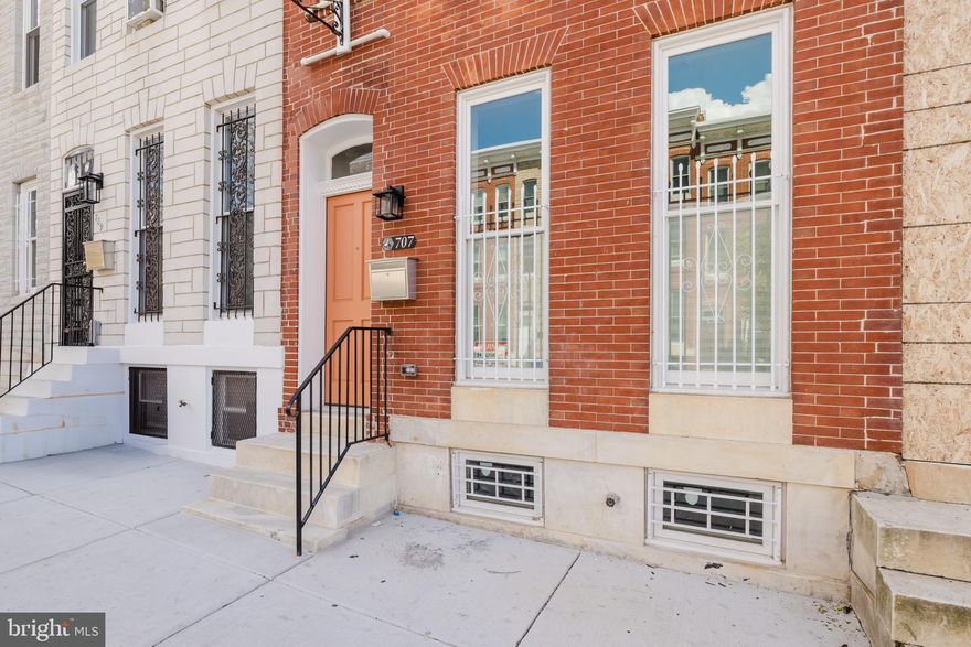 Note: SELLER WILL GIVE $5,000 IN SELLER HELP and free washer and dryer with use of preferred lender and title company. HUGE CHAP tax credit (greatly reduces your taxes for 10 years. In addition, this home is eligible for many grants and tax breaks! Eligible for $10k V2V grant towards down payment (as long as V2V has money in their program) and buy back the block (give up to 20K to eligible buyers). These and other grant programs may be stacked. **Charming & Completely Rebuilt 3-Bedroom Home Baltimore Townhome!**  Newly Rebuilt Home meaning other than the foundation, the marble stoop and some brick, we have newly constructed  everything; New Water lines, New sewer lines, New Framing, New walls, New Floors, New windows, New Roof, New Electric, New Plumbing, New systems and more.  Step into this beautifully rebuilt 3-bedroom, 2.5-bath home featuring an open floor plan and high ceilings throughout. The spacious living room boasts floor-to-ceiling windows, filling the space with natural light. HARDWOOD FLOORING flows seamlessly into the eat-in kitchen, which showcases brand-new granite countertops, stainless steel appliances, and a convenient half bath on the main level.  The fully fenced backyard is perfect for entertaining. Upstairs, upper 1, offers two generously sized bedrooms that share a full bath, along with a conveniently located laundry area. Upper 2 is dedicated to the stunning primary suite, complete with a private full bath and cozy bedroom retreat.  Brand-new carpeting extends throughout the upper levels. The lower level includes extra insulation for added protection and an abundance of storage space.  This stunning home is truly a **must-see**—don’t miss your chance to call it home! LOCATION! LOCATION! LOCATION! Walkability to the inner harbor Johns Hopkins Hospital less than 2 miles, 6 bus stops nearby, metro station 10 minute walk, train station 5 minute walk, light rail 1 mile away, airport 10.6 miles.