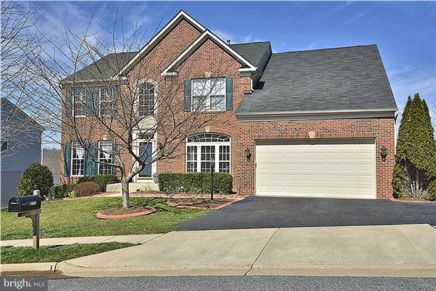 Amazing home boasts 4,700+ finished sf on 3 lvls, gleaming Hardwood floors, 9  ceilings, formal LR, DR & main lvl Office. Bright, Spacious KIT with  Granite counters, Island, Breakfast bar & 42" cabs opens to Fam Rm & Sunroom leading to deck & fenced rear yard. Basement includes full BA, Exer Rm/BR, Media Rm, Rec Rm, dry bar & walk out to beautiful patio offering sensational sunset views.