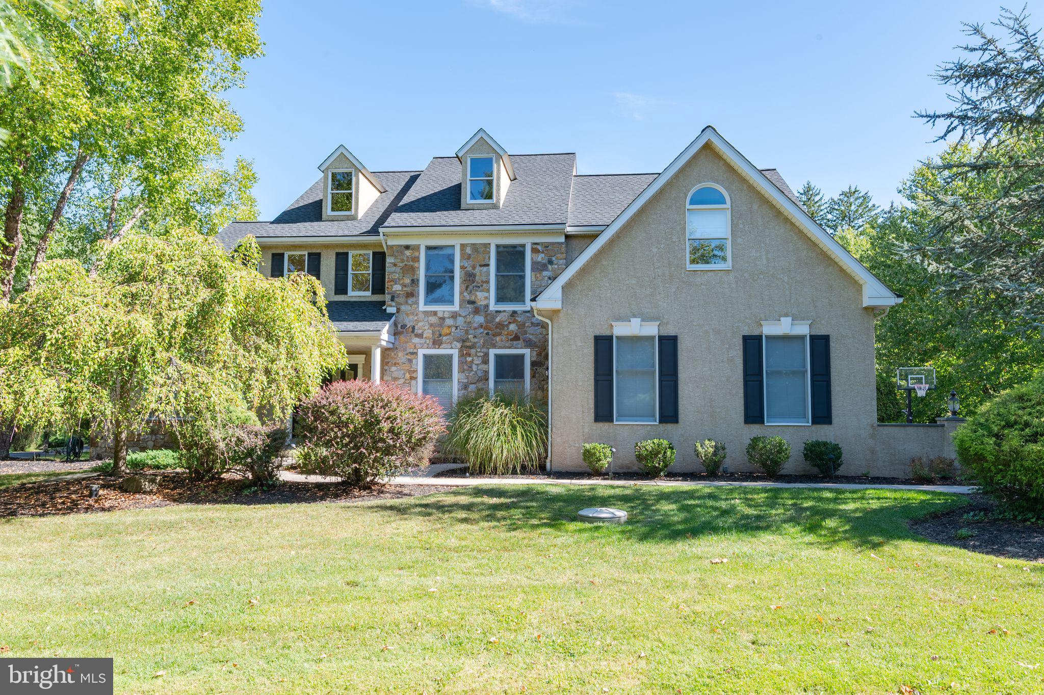 Tastefully updated, spacious, bright, and airy home. Extensive Smart Home equipment, fresh neutral paint, updated flooring, and updated lighting throughout. Enter through the bright, two-story foyer with refinished staircase flanked by living room with vaulted ceiling and private office, then continue to the spacious, sunny kitchen with breakfast area adjoining the family room with cathedral ceiling and second refinished staircase. Updated laundry room. Three car garage with interlocking floor tiles. Front and back staircases lead you to the second floor where a spacious primary suite awaits with updated bath featuring marble counter, comfortable LVP flooring, and the ultimate spa shower with audio, tv, whirlpool, and sauna as well as large closet with extensive built-in organizers. Convenient second laundry. Two additional bedrooms and a hall bathroom are centered on the second floor, and a fourth bedroom with ensuite completes the second floor. Large unfinished attic. Sprawling finished basement with room for entertainment, gym, and play areas as well as unfinished storage area. Newly renovated 2024 pool and smart pool equipment. New roof 2022 and new Gutter Guards 2023 (no gutter cleaning!). Level II EV charger hook up. Automatic stand-by generator. Willit's Pond neighborhood features private community pond access and open space. Amazing location across from top Wissahickon schools with short walk OR school bus ride to all grades K-12. Located in a private, secluded enclave. Call now for your personal showing!