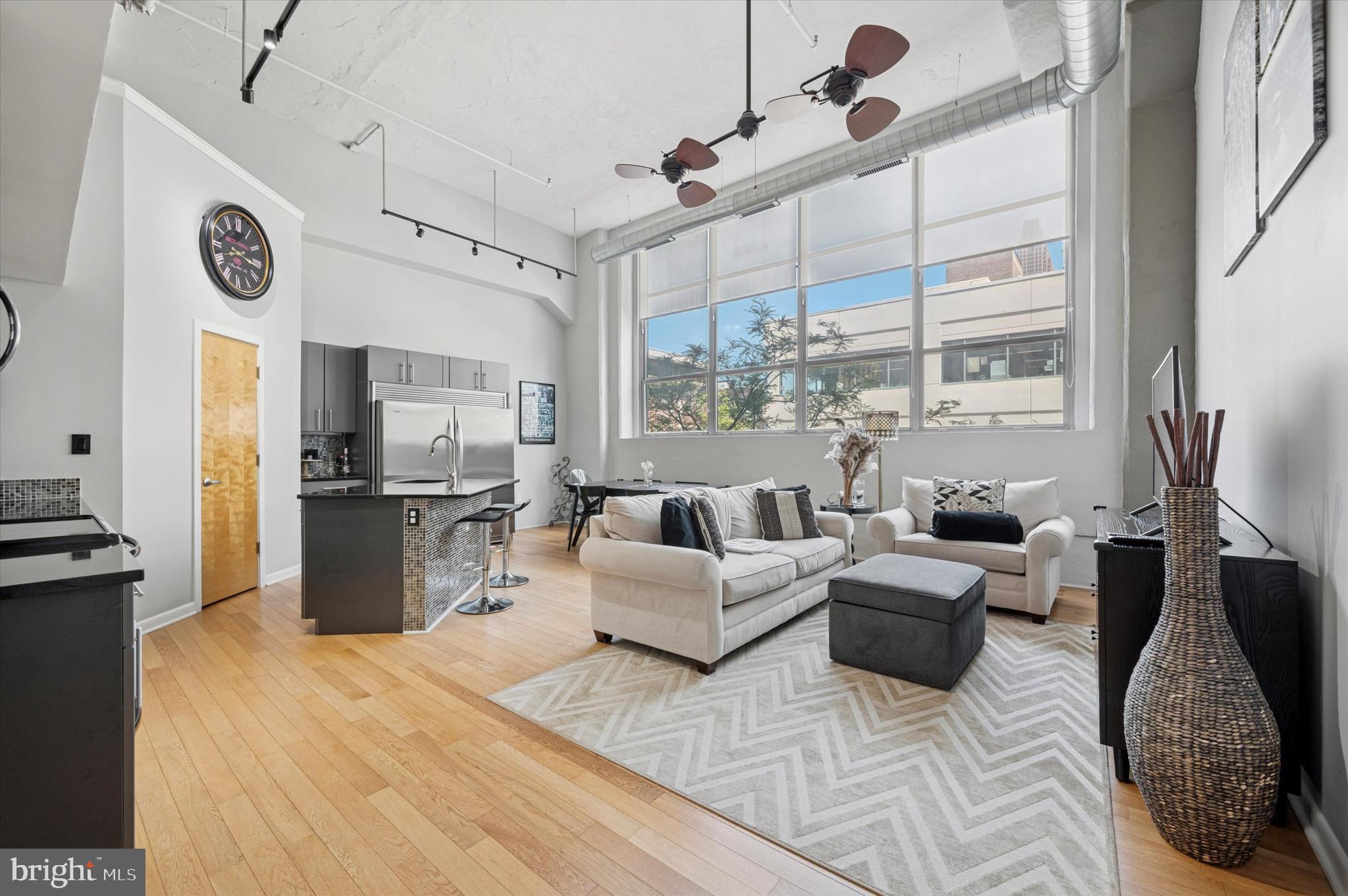 Stunning 2 bed, 2 bath loft with PARKING INCLUDED in Logan Square! This spacious apartment located in 2200 Arch features very soaring ceilings and large east facing windows with tons of natural light. The first level of the apartment has a full bathroom, a generously sized bedroom, laundry, an open living room with plenty of space for a living and dining set up and a renovated kitchen with island! The second level of the unit has another bedroom and full bathroom. The building has a 24-hour door attendant, and a state-of-the-art fitness center complete this impressive loft-style residence. Perfectly situated in Logan Square and in the Greenfield School Catchment, this residence is close to restaurants, shopping, parks, and public transportation. Trader Joe's, Giant Food Store, the Schuylkill River Trail, the campuses of Penn and Drexel, 30th Street Station, and major hospitals are all minutes away. Tenant pays all utilities. Pets considered case by case. Inquire for more details.