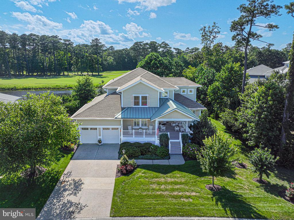Step into a realm where luxury meets leisure, nestled within the prestigious gated community of Glen Riddle. This isn't just a home; it's a meticulously curated sanctuary, the "Derby" model, offering an unparalleled lifestyle for the discerning individual. From the moment you approach the extra-large front porch, you'll realize no detail has been overlooked. Imagine waking up to expansive, breathtaking views of the War Admiral 1st hole and pond. For the golf enthusiast, this property presents a unique opportunity: the initiation fee to become a member of the War Admiral Golf Club can be transferred with the property. It’s not just a home; it’s your personal gateway to the greens. Every conceivable upgrade has been thoughtfully integrated into this stunning coastal home. From crown molding to custom built-in cabinets throughout, the interior exudes sophistication. Electric silhouette blinds, plantation shutters, or elegant curtains, ensuring both privacy and style. You’ll find only the finest materials underfoot with upgraded tile, hardwood, and carpet flooring. Never fret about power outages, thanks to the Generac whole house generator. Peace of mind is further enhanced by a new roof installed in 2023 and a durable concrete exposed aggregate driveway and sidewalks. Inside, the convenience continues with a central vacuum cleaner featuring two automatic dustpans in the kitchen and laundry room. For ultimate comfort, a water conditioner, Rinnai water heater and a hot water recirculating system mean instant hot water, every time, everywhere. Even the surrounding landscaping is a masterpiece, with meticulous details at every corner, effortlessly maintained by a Rain Bird underground sprinkler system. Truly, no expense was spared.
The heart of this home is undoubtedly the gourmet kitchen, a chef's delight. It boasts a magnificent Viking range, upgraded maple cabinetry with molding, and exquisite Silestone countertops that wrap around for ample counter seating. A custom island provides extra counter space and storage, while the Bosch dishwasher new GE Monogram double oven and complete this culinary haven. The first floor features an oversized owner's suite. This private retreat includes a double-sided gas fireplace with a custom-made mantle, a spacious walk-in closet, and a vaulted tray ceiling. The en-suite bathroom is a spa-like sanctuary with a Jacuzzi bathtub, a separate stand-up shower, and a private water closet. An attached sitting room offers a tranquil space to unwind, with direct access to a three-season carpeted porch that also has two entries to the main house. The living room is a grand affair, boasting two-story views and a gas fireplace with a custom mantle. Flooded with natural light, it also features a retractable outside shade for customizable ambiance. A second bedroom or office on the first floor offers flexibility and convenience, with a full bathroom just around the corner. The two-car garage is an organized dream with built-in cabinets, wall-hanging storage solutions, a new 2025 refrigerator, and a sleek epoxy floor coating. Ascending to the second floor, you'll discover a spacious loft, a versatile living area that many have transformed into a fifth bedroom in similar homes. The second floor also features two oversized bedrooms or offices, sharing a double-vanity en-suite bathroom with a tiled tub-shower combo and walk-in closets. These rooms also offer exceptional views, and one boasts an entire wall of built-in custom cabinetry. Glen Riddle isn't just a community; it's a lifestyle. Enjoy a wealth of amenities, including a gym, outdoor pool, clubhouse, sauna, boat ramp, marina, tennis & pickleball courts, also two spectacular renowned golf courses. For those special evenings, Ruth's Chris Steak House is right within the community. This home is more than a residence; it's an invitation to the good life and endless possibilities. Are you ready to discover your new beginning?