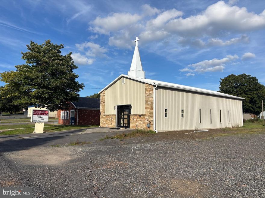 Price Improvement of $10,000.00!  Outstanding Opportunity!  Well built metal frame building and large parking lot.  Includes all town utilities and natural gas.  2 bathrooms and 3 separate office rooms plus large main room. Easy street access.  3 Lots Each Measuring 40x120 And Totaling 0.33 Acres.  The sky is the limit on what you can do here.  Church, Banquet Facility or Lodge, Day Care, Hair Salon, Health Club, Storage Unit With Climate Control, Grocery Store,  Any Kind Of Retail Sales You Can Imagine, .   Priced To Sell.  Call Today For A Showing.