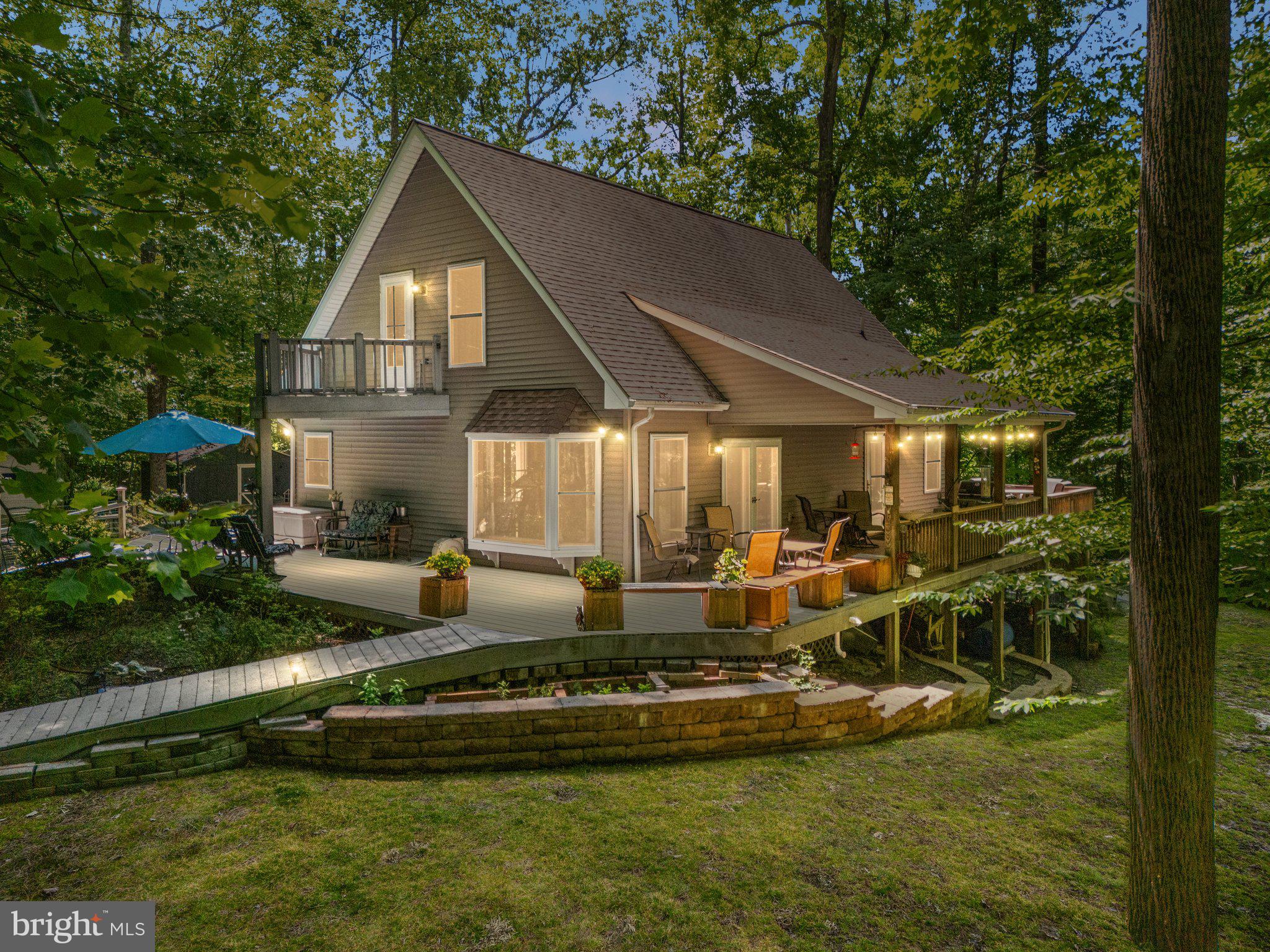 MULTIPLE OFFERS - HIGHEST AND BEST DUE SUNDAY AT 3 PM . SELLERS TO REPLY ON MONDAY THE 9TH
Welcome to this charming Cape Cod-style home, peacefully perched atop 2.02 scenic acres. Offering breathtaking views and frequent visits from local wildlife, this property is a nature lover’s dream. Thoughtfully designed for first-floor living, the main level features a spacious primary bedroom with en suite bath, a convenient laundry area, and easy access to the outdoors from multiple points throughout the home.
The wraparound three-sided deck—with ramp access—invites you to relax, entertain, or simply take in the serenity that surrounds you. Upstairs, you’ll find a large second-level room ideal for a third bedroom, home office, or private retreat.
The expansive walk-out basement is currently unfinished, providing endless potential for additional living space, storage, or hobby areas. Lovingly maintained with detailed documentation from the original owners, this home offers not just a peaceful setting, but a story of care and pride that you’ll feel from the moment you arrive.