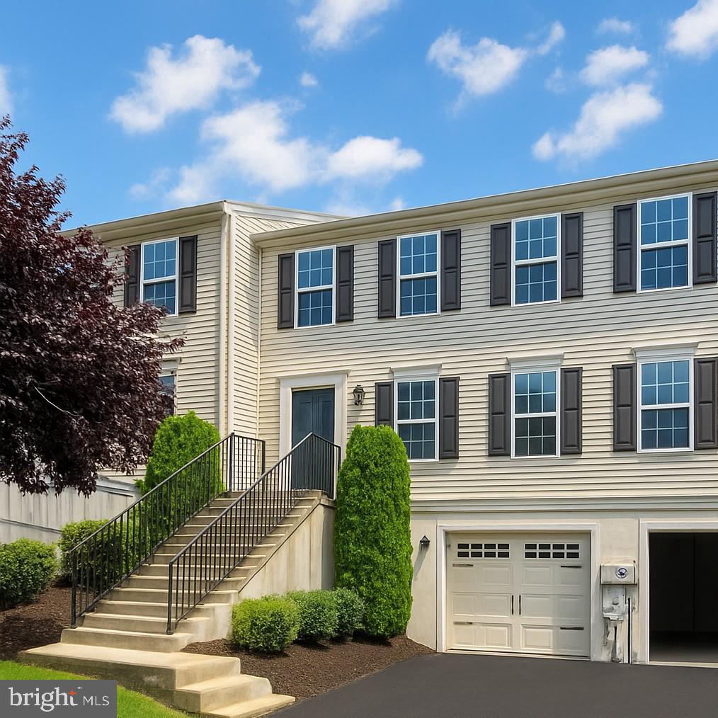 Rarely offered and beautifully updated Parkview Village Townhome in Exeter Schools! This interior unit offers over 2,100 square feet of living space, featuring 3 spacious bedrooms, 2.5 bathrooms, and a 1-car garage. Step inside to find brand new flooring throughout, new granite countertops, stainless steel appliances, fresh neutral paint, and stylish new fixtures. The expansive main level includes a bright living room, a separate dining room, and an upgraded eat-in kitchen with new granite countertops, and new stainless steel appliances. Sliding doors in the back lead to the rear deck—perfect for relaxing or entertaining. A convenient powder room completes the first floor. Upstairs, the oversized primary suite offers a walk-in closet and private full bath, with an added linen closet. Two more generously sized bedrooms, a full hall bath, and a large second-floor laundry room provide plenty of space for everyone on the second floor. The HOA takes care of lawn care, snow removal, and trash service, making for low-maintenance living. Don’t miss your chance to own this move-in-ready home—schedule your showing today!