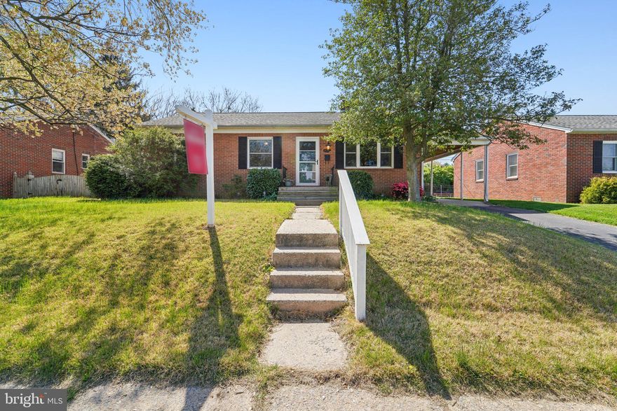 Enjoy single-level living in this ALL BRICK 3 bedroom, 1 bath ranch home close to downtown. Walk into hardwood floors throughout and newer SS kitchen appliances that are just a year old. The home has gas heat and a gas stove for cooking. Off the kitchen, there is access to the newer W & D, as well as the carport and fenced backyard.  There is a pull down stairway with a built in floor for additional storage in the attic - there is no basement. Roof and windows were replaced 10 years ago. This home comes with 3 window AC units.  This home is conveniently located near Fort Detrick, and close to commuter routes. Walk to Baker Park and Culler Lake from here. No HOA.
