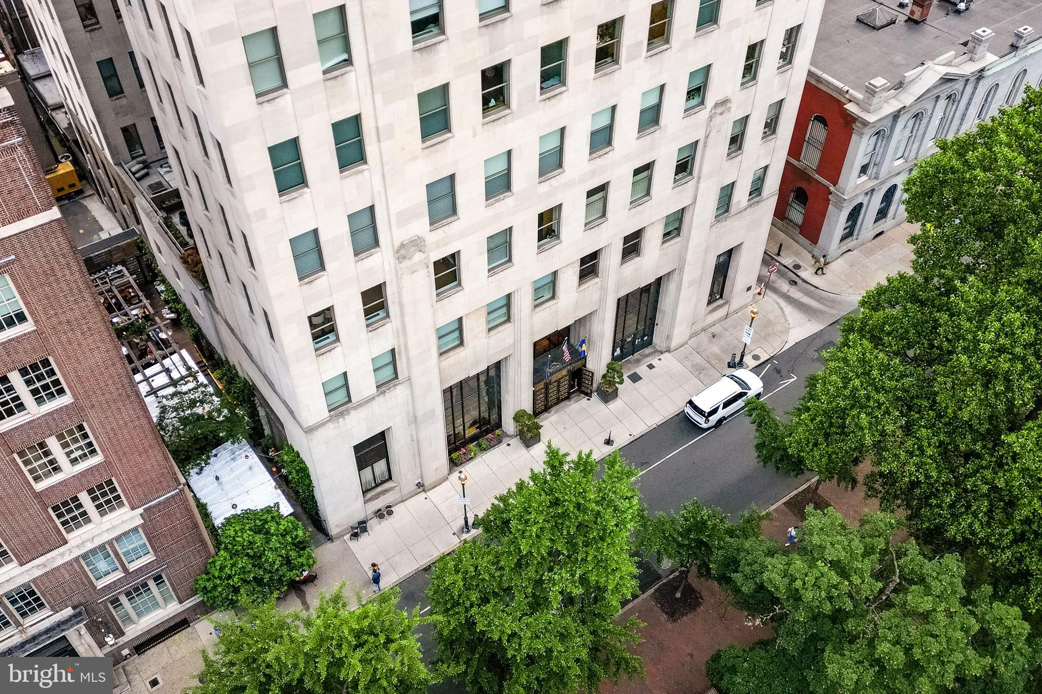 Don't miss this once in a lifetime opportunity to own one of the Premier residences in the Society Hill section of Philadelphia. This 12th floor residence offers spectacular views of the Southeastern part of the city while over looking Washington Square park. This magnificent custom two bedroom, 2.5 bath home offers an exquisite layout featuring perfect views of the Square, both bridges and the river. The open floor plan with amazing natural light creates the perfect living space with 11’+ high ceilings. The kitchen has been upgraded to include an extended island and custom counter tops along with Miele and Subzero Appliances. There are customized electronic shades and drapery throughout. The master bedroom and bathroom have just been renovated with custom features that you must see to appreciate. The master bedroom looks right over the Square where you can enjoy your morning coffee. There is a large walk-in closet with built ins and plenty of closet space throughout the home. The second custom Bedroom offers another private area within the residence with a luxurious en-suite bath. There is an added outdoor oasis that is private and breathtaking at the same time. The over sized private balcony offers views to the South, East and West and is a great way to wind down on those weather friendly evenings with stunning sunsets. The Ayer Condominium provides 24 hour concierge, security, valet, a chauffeur driven BMW-7 series, fitness room with a terrace and one on-site garage parking space with a charging station. The unit has a large separate storage facility that adds to another place for your personal belongings. The walk score is 99 and is within minutes of some of the most upscale shopping, restaurants and entertainment there is to find.
