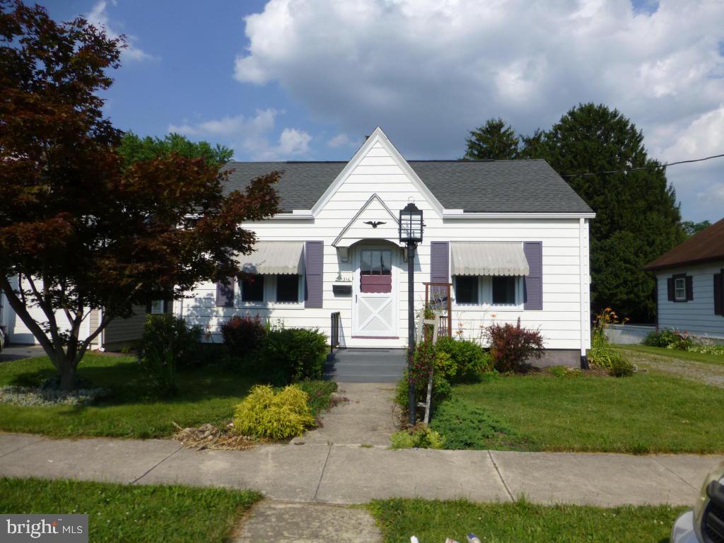 http://www.LebanonOpenHouses.com/Cape Cod in Annville-Cleona SD with hardwood floors throughout. Remodeled kitchen, newer roof, windows, water heater, heat pump and central air. Covered porch, 2 car detached garage with covered patio, peaceful backyard with asparagus, grape, and raspberry bushes, close to downtown amenities, $5000 seller assist toward bathroom and/or attic renovation. Attic could be 3rd BR.
