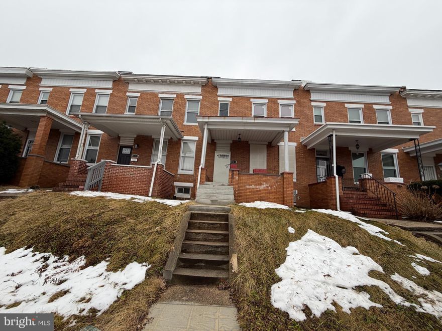 Spacious three bedroom and two full bath brick townhome located in the Montebello neighborhood features a huge covered front porch and a rear one car garage. The home features an updated kitchen and bathrooms and is in great condition. Stunning woodfloors throughout.