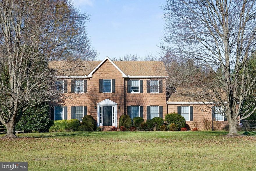Brick Colonial Oasis in Strawberry Hill, Warwick, MD! 🌟 Situated on 2.11 private acres in the desirable Strawberry Hill community, this stately brick colonial combines timeless elegance with modern upgrades. Located just minutes from Middletown and the Route 301 bypass, this home offers both convenience and serenity. The first floor features a spacious, light-filled family room with French doors leading to an expansive deck overlooking the private backyard oasis. Enjoy a beautifully updated kitchen with granite counters, white cabinets, stainless steel appliances, and a cozy table area with views of the fenced inground pool with a new cover, hot tub, and lush landscaping. The main level also includes a versatile office or flex room. Upstairs, unwind in the main bedroom with an upgraded ensuite bath, three additional bedrooms, a second full bath, and a convenient laundry room. The lower level is partially finished, ideal for extra recreation or storage. With proximity to Cecilton Elementary and Bohemia Manor Middle/High School, this home is a perfect blend of privacy, space, and accessibility. More details coming soon!