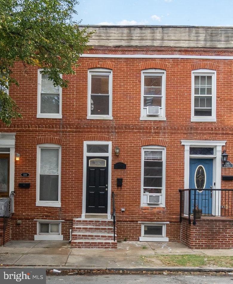 Charming Row Home in Pigtown!
This beautifully updated brick-front home features an open floor plan with hardwood floors, fresh paint, and a finished basement. Offering 2 bedrooms and 2 full baths, the bedrooms are enhanced with elegant tray ceilings. Enjoy a spacious backyard with a carport for convenient off-street parking. Nestled on a quiet street, this home is just minutes from the stadiums, downtown attractions, and major commuter routes—perfect for city living with easy access to everything you need.