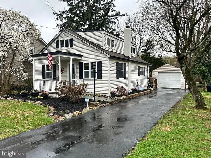 Welcome to this charming home in historic Washington Crossing! This 2 bedroom, 1 bathroom home with a designated office space sits in a friendly riverside neighborhood surrounded by scenic views and nature. Featuring a private driveway and detached garage for ease of parking or keeping your car clear of snow in the winter! Step inside and you are greeted by beautiful restored hardwood floors and an airy living room soaked with natural light. To the left is a nice space for a home office, currently used as a hair studio. Through the living room is the open concept kitchen equipped with new flooring, recessed lighting, quartz countertops, white shaker cabinets, newer appliances, plenty of storage and counter space, and a breakfast counter with bar seating. Behind the kitchen is a dining room with a large picture frame /window with views of the expansive backyard and canal. One nice sized bedroom with ample closet space, as well as the fully updated large bathroom featuring a new tiled shower, double vanity, and a stylish patterned tile floor round out the first floor. Up the stairs on the second floor, you will find a HUGE bedroom with two closets, and plenty of room for another home office or sitting room. As you make your way outback, you step into a private oasis featuring a gravel pathway leading to a sitting area, and a fire-pit. The fenced backyard backs into a wooded area with views and access to Houghs Creek, perfect for morning strolls or letting your dog run wild.  Access to the Canal Path nearby!  Bilco doors leading into the basement for ease of storing items in the unfinished basement. Easy access to highways, train stations, NJ, New Hope, Yardley, Newtown, and more! This home truly has it all and will not last long! Reach out to schedule a showing today.