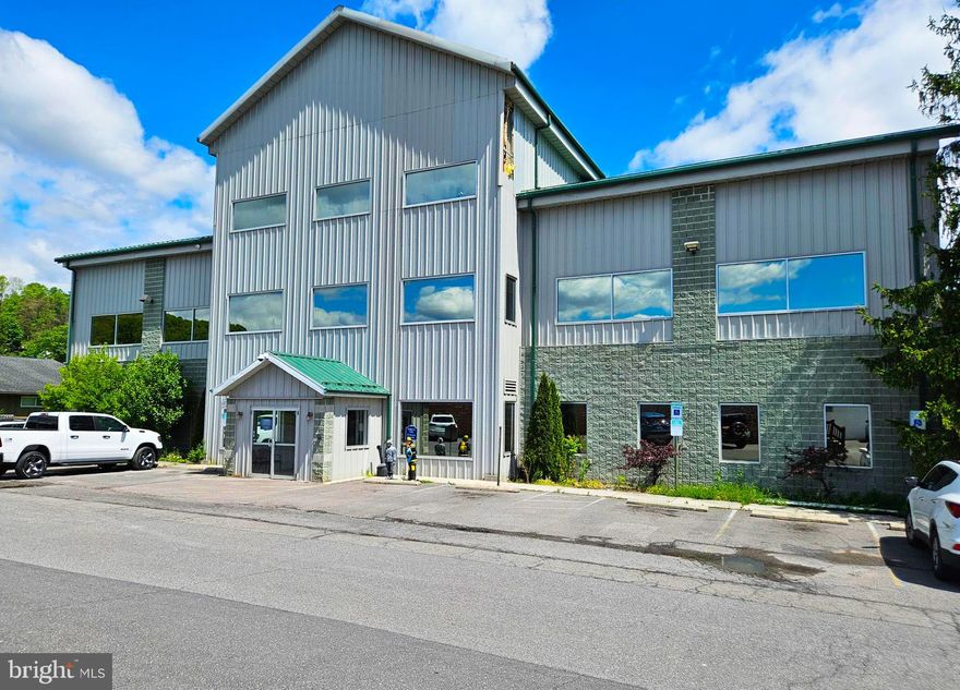 Two story medical office building with a loft • Formerly multi-tenanted • Elevator served • Built in 2004, brick and pre-engineered metal facade • Roof - Standing seam metal • Large, coated steel pylon signage
• Excellent visibility and access fronting National Highway in LaVale • Heat - Gas York system • Cooling - York condensers