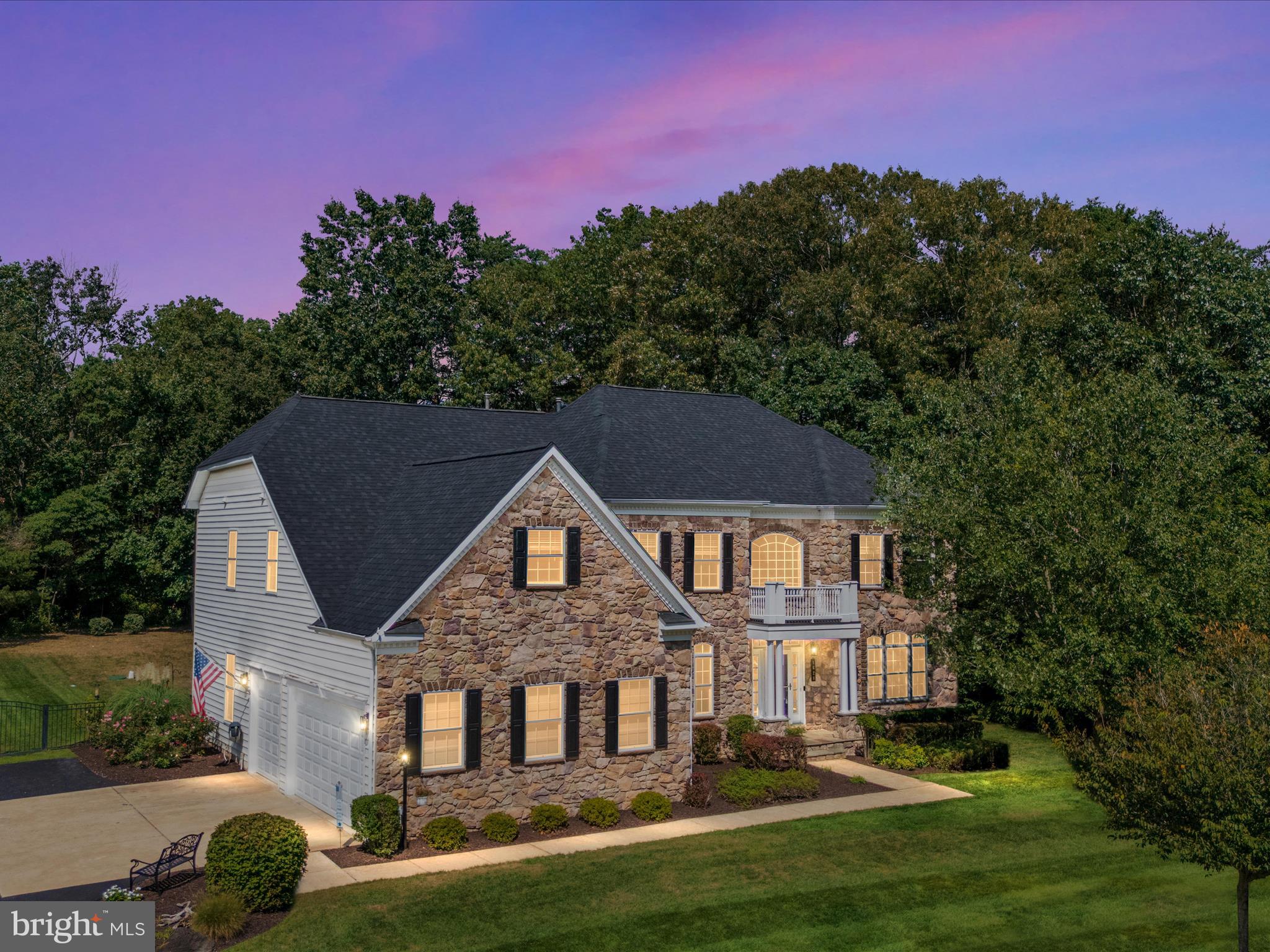 This stunning 5-bedroom, 5.5-bath home offers elegance, comfort, and space on nearly an acre of beautifully landscaped grounds located adjacent to Pasadena's Premier 36-hole Compass Pointe Golf Course...which offers four 9 hole courses spread over 800 acres! Step inside to soaring ceilings, abundant natural light, and a flowing layout designed for both everyday living and entertaining. Beautiful newly refinished hardwood flooring, new carpet, brand new roof in 2025, updated kitchen appliances, newer hvac, and fresh paint throughout. The gourmet kitchen with additional sunroom opens to an expansive family room with a stone fireplace. A den on the main level offers space for a home office or can be easily converted to a main level bedroom. This home offers an elegant dining room and living room for those more intimate formal affairs or additional space for large groups. The upper level features a bath to each bedroom, including a spacious primary suite with spa-like bathroom and walk-in closet. Lower level has a bonus room that can be used as another ensuite with a kitchenette, perfect for multifamily living. Another family room space, workout room and extra storage area. Outdoor living is equally impressive—relax on the deck, host gatherings in the oversized backyard, or enjoy peaceful views of the golf course beyond your property. Plenty of parking with a 3-car attached garage and spacious driveway. Located in one of the area’s most sought-after golf course communities situated between Baltimore and Annapolis, this home blends privacy, and convenience to nearby shopping, dining, and local beaches.