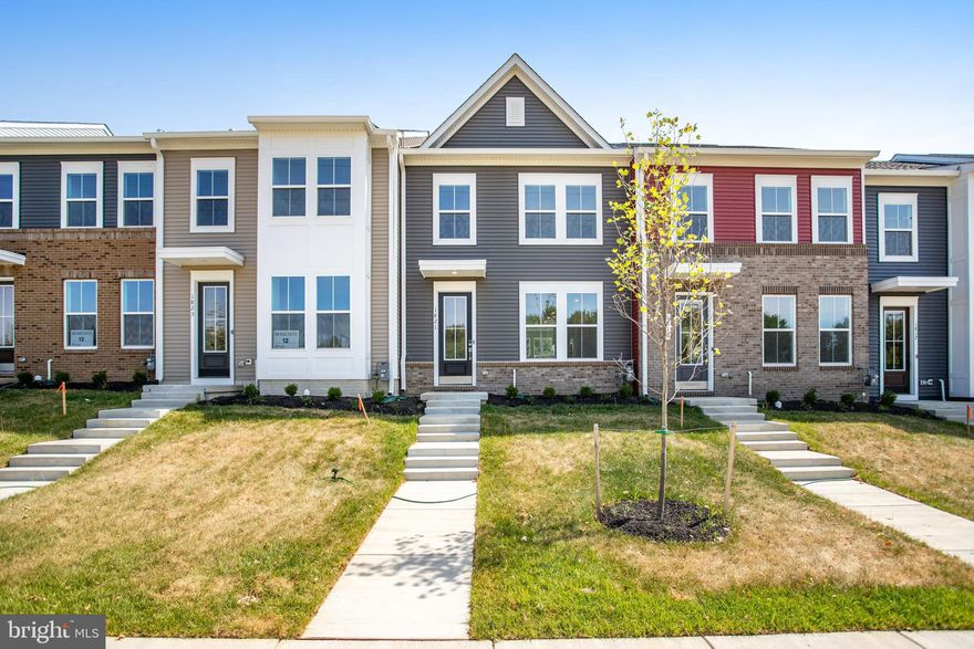 MOVE IN THIS FALL!***This charming townhome includes a number of stunning features:  Open and airy floorplan, perfect for entertaining.  Gorgeous Elements style kitchen with large island for meal prep and casual dining, stainless steel appliances, upgraded cabinets and upgraded granite countertops, plus pantry and pantry cabinet.     Sun-lit dining area with access to the patio and an adjacent, versatile HovHub with barn door off the dining area for a quiet place to work.  
 Luxurious primary suite with a large walk-in closet and attached bath with quartz countertops on dual vanities, upgraded ceramic tiled shower and private water closet.    Our LOOKS design team have coordinated all of the interior finishes to make this home complete.  
****The Towns at Gambrill Glenn is a stunning community of 110 new townhomes for sale in the city of Frederick, Maryland. Homeowners can enjoy shopping, dining, and entertainment options all close to their new home. Live nearby commuting routes, I-70, I-270 and Rt 15. Each home is offered in one of our new interior design Looks: Loft, Farmhouse, Classic or Elements for on-trend style in your new home.
Offered By: K. Hovnanian at Gambrill Glenn, LLC.  Prices and terms subject to change.