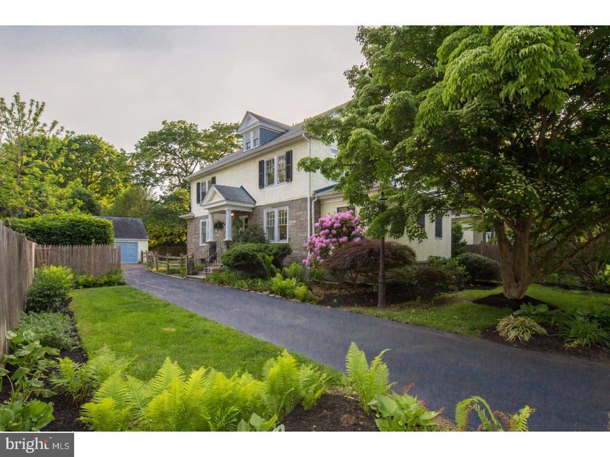 Classic Wyndmoor homestead! Light-filled and charming Colonial in great location. First floor has lovely entrance hall, living room with stone fireplace, open kitchen and dining room, family room, mudroom, and powder room. Second floor features 4 very large bedrooms and tiled hall bath. A walk-up attic offers potential to expand square footage and create an awesome master suite, office, and/or additional bedrooms. Exterior features fabulous rear yard that is perfect for play and entertaining, plus a very versatile, over-sized 2 car garage. Easy walk to everything in Wyndmoor, and just a few short blocks to Chestnut Hill. Close to regional rail, Lincoln Drive, and Rt 309 so any commute is a breeze!