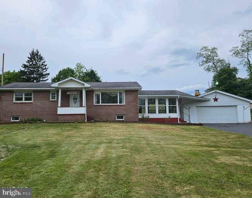 Sweet brick and vinyl 1 story in Antis Township! 2 large bedrooms, 1 updated tile bath, main floor laundry, eat-in kitchen with all appliances and great heated sunroom addition that leads to the 25 x 27 2 car garage! The basement is partially finished with an interior french drain and sump pump. 100amp electric.