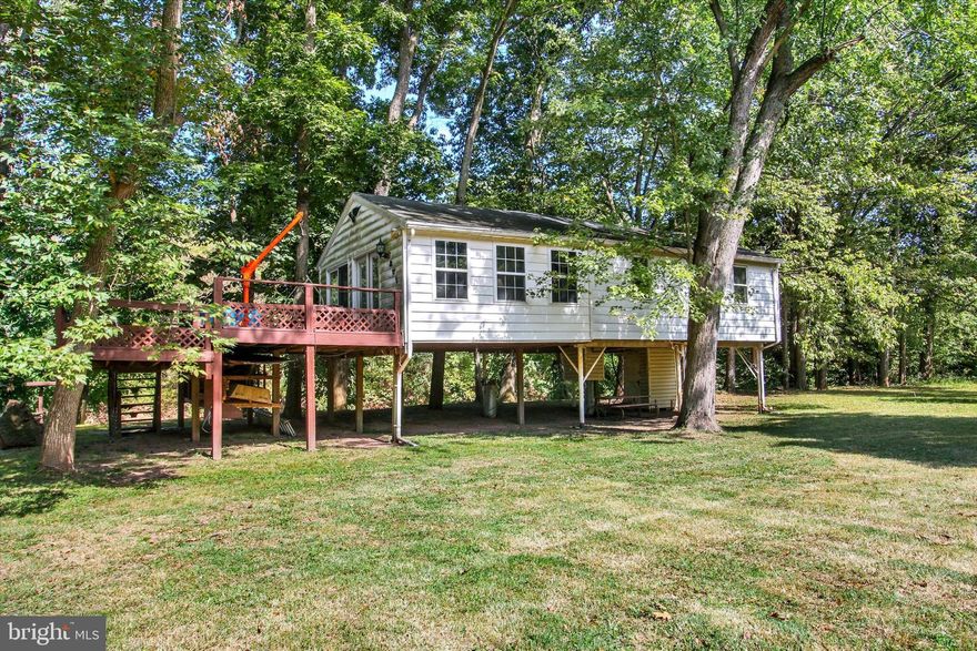 Welcome to 719 Creek Rd in East Berlin—a charming cabin that has been in the same family for many years and the setting for countless gatherings. Now it’s time for the next family to make memories here.  
This cabin borders the Conewago Creek, where you can literally cast a fishing line from the deck. Features include a sun porch, an open-concept living space, two sleeping areas, and a bathroom. Please note: water must be brought in and owners are responsible for disposal of debris and sewage.  Lot size: 0.034 acre.  Enjoy a quick and affordable getaway—without the three-hour drive to Perry County—right here in your backyard.