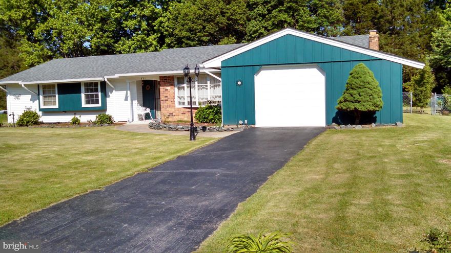 No HOA. Minutes to everything yet tucked away with a spacious and private fenced in back yard. Large lot is mostly plush low maintenance Zoysia grass with many Knockout roses and Hydrangeas on the borders and fruit trees, blueberries, and blackberries in the back. Master suite addition in 2013 includes luxury master bath with dual vanities, a large walk-in closet, and sitting room. Accessible attic in the addition has lots of floored storage space. Durable Engineered Bamboo flooring installed in 2018.  Butcherblock Teak countertops and counter-bar highlight the kitchen. One year old range. Oven never used. 8 ceiling fan /light combos throughout the home save on utility bills. 30 year engineered shingle roofing installed professionally in 2017. All prior roofing materials removed. Spacious living area with a fireplace surrounded by built in wood bookcases. Dual pane windows. Covered patio has electric outlets and is wired for ceiling fan/light combo overhead. A/C unit replaced in 2016. Extra large garage has plenty of shop/storage space. 118 sq.ft. NTC multipurpose bonus room off kitchen. Listing Agent is owner.