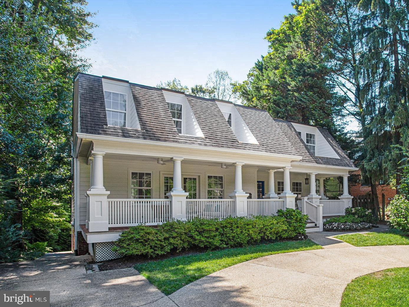 Welcome to 6440 Brookes Lane in super close-in Bethesda! Just moments to the DC line, this modern Bungalow is the idyllic storybook dream home that promises delightful summer soirees on the expansive front porch and treed views and peaceful sunsets from the back deck. Inside, this 5 bedroom, 3.5 bathroom home has been refreshed and upgraded and is move-in ready. On the main level, a fantastic layout delivers great circular and indoor-outdoor flow, perfect for entertaining. An over-sized living room features double French doors to the front porch. The formal dining room is flooded with light from the West-facing bay window and features a new dramatic light fixture. The expansive brand new kitchen (featuring Shaker-style cabinets, quartz countertops, new GE Cafe appliances, upgraded recessed and under cabinet lighting, and tiled backsplash) has ample storage, space for a casual dining table, and adjoins a delightful family room space with wood burning fireplace. French doors lead to the rear deck, perfect for al fresco dinners. Other features to round out this level include newly refinished hardwood floors, recessed lighting, a powder room, coat closets, and pantry.
This home offers 4 large bedrooms upstairs. The primary suite is a perfect relaxing retreat and is spacious enough to accommodate a king sized bed, dressers, nightstands, and a seating area. The newly renovated en suite spa-like primary bath features a large soaking tub with quartz surround, double vanities, a tiled shower, upgraded lighting and fixtures, and a stunning Western view from the large picture window. With a large walk in closet, and a second reach-in closet, there is space for everything. The remaining secondary bedrooms all boast spacious closets and new ceiling fans. The hall bath has been recently refreshed with a newly tiled bathtub surround, new flooring, upgraded lighting and new tub fixtures. A special feature of this level is a large alcove, perfect as a work from home space, play room, TV den, or any other use you can imagine. Enjoy the gleaming refinished wood floors throughout this level as well.
The lower level is also fully finished and refreshed and is on grade with the backyard, so there are large windows for great natural light and a door that walks out to the rear stone patio and backyard. This level offers a large family room/recreation room with ample space for lounging furniture as well as play spaces. With new luxury vinyl plank floors, you'll enjoy durability and easy maintenance for years to come. With the 5th bedroom and renovated 3rd bathroom on this level, it is a perfect space for guests.
Outdoors, the large circular driveway can easily accommodate 4 cars. The lush, mature landscaping includes flowering shrubs, ornamental grasses and a bank of hydrangea bushes.
If the home itself were not enticement enough, consider the fantastic location. Brookes Lane is a quiet enclave of homes, but superbly located to make access to all of the necessary and desired amenities a breeze. Located less than 1 mile to the DC Line, access to work and play is moments away. Enjoy local favorites like the newly opened Wagshal's Grand Bodega, the Brookmont Farm Market, and Gregorio's Trattoria. Explore nature at any of the many trails and parks located close by, including the Capital Crescent Trail and the Little Falls Stream Valley Trail. The home is within bounds to the Whitman/Pyle/Bannockburn public schools and close to many private school options as well.
This is not a dream, this wonderful home is real and ready for you.