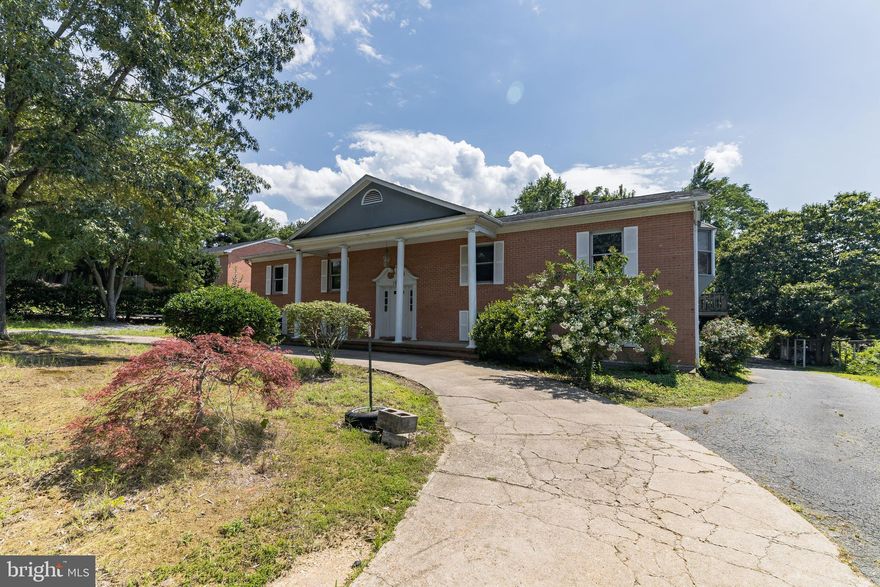 Investment Opportunity only 5 min from Mary Washington University!  Welcome to this stately brick home with 10 bedrooms and 4 bathrooms. Both the main and upper level include 5 bedrooms, 2Full  baths. Plenty of parking within the circular driveway and side driveway. Live on the first or second level and rent out the other floor! Easy access to shopping, dining, rt 1 and 95.