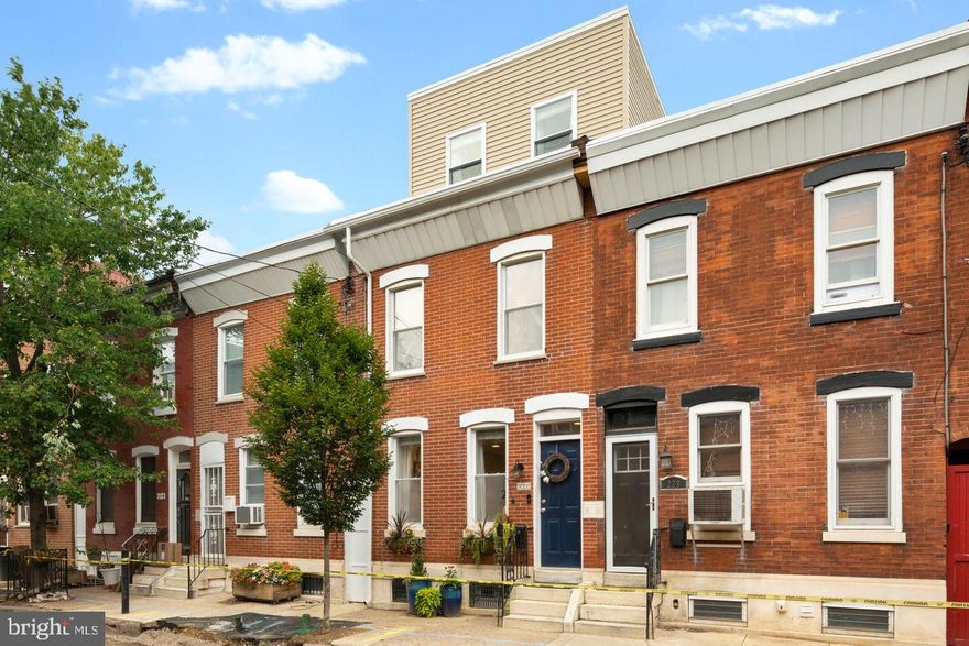 Tucked away on a tree-lined, low-traffic block in the heart of Pennsport sits 231 Watkins St. This updated 3 bedroom, 2.5 bathroom home offers plenty of space in a thoughtful layout, including a finished basement and a full floor owner’s suite with a bonus office space. A meticulously maintained brick exterior invites you into the open living room and dining area where two tall windows shine tons of natural light onto the beautiful hardwood floors. Recessed lighting illuminates each room of the home including the large modern kitchen adorned with tile floors, stainless appliances, a granite countertop, and a tile backsplash. Out back is a secluded private patio where you’ll want to spend most of your summer days and nights entertaining and relaxing. The finished lower level with its cozy carpeted floors is the perfect space for a media room or playroom. A convenient half bathroom sits at the rear of this level next to the separate laundry room. Hardwood floors run throughout the 2 bedrooms on the second level. A large hall bathroom features tile floors, an extra-wide vanity, soaking tub & shower combo, and a linen closet. On the recently added third level is where you’ll find the owner’s suite comprising of a large bedroom with 2 windows, a ceiling fan, and double closet. The spa-like ensuite boasts marble floors and shower surrounds along with a custom vanity. Completing this level is a bonus space the can be used to your liking, possibly as an office, closet, or nursery. This home’s spectacular location is close to Dickinson Square park, and tons of local restaurants and coffee shops like Moonshine, Federal Donuts, Hermans, and The Dutch. Plus, nearby shopping on Delaware Ave includes Target, Acme, Fine Wines & Good Spirits, Ikea, and Lowes. There’s also quick access to I-95 and South Jersey via I-76. Contact us today for in-person and virtual touring options!