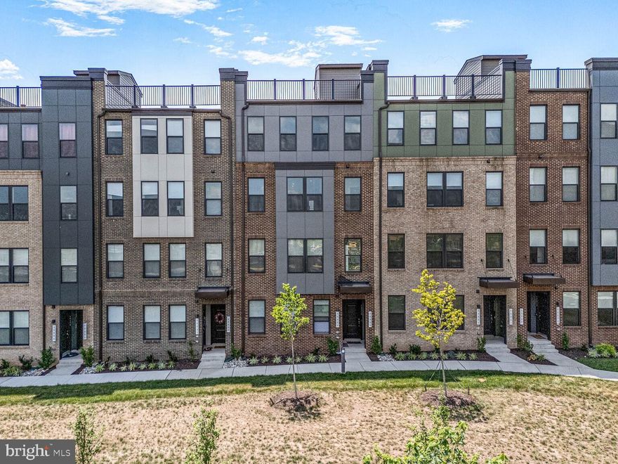 $10,000 Price Reduction!  Incredible Condo that is only 2 years old and Barely Lived in! Luxurious Stanley Martin Sought after Julianne Model with BONUS- Office on Main level!  Fabulous Open floor plan with gorgeous upgraded Quartz Counters & White Gloss Backsplash Kitchen,  White Cabinets, Double built-in Trash Cans, Stainless Steel Double Ovens, Microwave, Cooktop, Refrigerator, & Dishwasher.  Huge walk-in Pantry.  LVP flooring on the main level. Plenty of Natural Lighting,  New Chandelier in Dining Room.  Private Covered Balcony. Upper level boasts LVP flooring in the hallway with upgraded carpet in bedrooms. The Primary Bedroom is HUGE with a ceiling fan,  very large walk-in closet. Primary Bath has dual separate sink/vanities with Granite Tops, a walk-in shower, and a private water closet.
 2nd & 3rd Bedrooms have ceiling fans. The Guest Bath has a large Granite Top vanity. Laundry room located on this floor has a  full-size stackable washer & dryer.

From this level, you go to a very PRIVATE Roof Top Terrace.  Super amazing and has incredible views.

All this in this amazing home PLUS - walkable to ONE Loudoun, trails throughout the area, and the Farmers Market is right there on Saturdays.

This is a MUST SEE! Home!