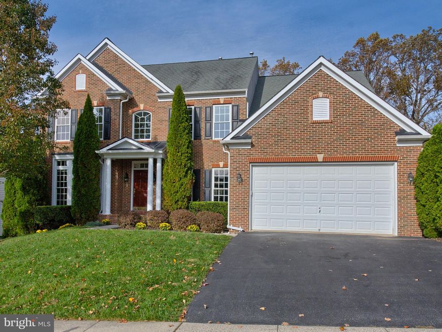 You'll think you're on a private lot! This beautiful NV home has new flooring throughout (carpet and refinished hardwoods). Situated in the Villages of Urbana, this home boasts hard-to-find features--including a main level bedroom and full bath. The walk-out lower level features a bedroom, full bath, recreation area & two storage areas! On the upper level, you'll find 5 bedrooms and 3 full baths. The spacious kitchen features stainless steel appliances, a huge island & expansive morning room. Great space throughout and perfect for entertaining with a large living area, dining room & family room with fireplace! Walk out from the morning room to the deck with a lovely view overlooking this private wooded oasis.  Enjoy the fantastic community amenities in the Villages of Urbana--including two pools, work-out room, playgrounds and more!