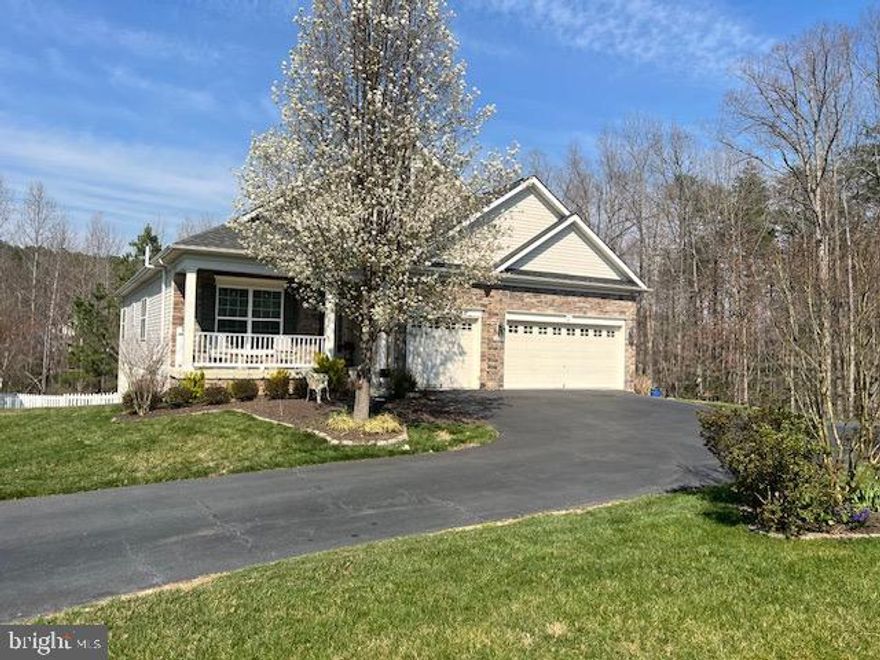 A truly remarkable home! Main level just painted and new carpet in the main level  bedrooms being installed.    The private lot, spacious layout, and picturesque wood view is absolutely enchanting. The semi-open living areas and abundance of natural light create an inviting atmosphere perfect for both relaxation and entertaining. And who wouldn't love the convenience of a fabulous primary bedroom suite, complete with its own serene oasis?

The deck with its Sunsetter awning is the ideal spot for enjoying outdoor gatherings rain or shine, while the fenced yard and stamped concrete patio offer additional space for leisure and recreation.  Protected by Home Team Defense Traexx pest control.  And with a 3-car garage and ample off-street parking, practicality meets luxury effortlessly.

The thought of waking up to the bright sun filtering through the trees and savoring morning coffee in the beautiful kitchen area is truly delightful. The option to shoot some pool or entertain guests in the large recreation room adds another layer of versatility to this already impressive home. Plus, the flexibility to set up a ground-level room in the basement as an office or hobby space, along with ample storage for seasonal decorations, ensures functionality meets comfort at every turn.

The amenities offered in the Virginia Heritage 45 plus community are designed to cater to the diverse interests and lifestyles of its residents. Here's a breakdown of the amenities listed:

Clubhouse: This serves as a central gathering place for residents to socialize and engage in various activities. It likely includes spaces for events, gatherings, and possibly fitness facilities.
Indoor and Outdoor Pool: Residents can enjoy swimming year-round with both indoor and outdoor pool options.
Billiard Room: A dedicated space for playing billiards, providing residents with a recreational activity.
Conference Room: Ideal for meetings, gatherings, or group activities such as book clubs or educational seminars.
Gated: Gated entry provides security and privacy for residents, offering peace of mind.
Social Director with Many Events: Having a social director suggests a vibrant community with a calendar of events and activities, fostering a sense of community and connection among residents.
Clubs: The community likely offers various clubs catering to different interests, hobbies, and activities, allowing residents to pursue their passions and connect with like-minded individuals.
Tennis/Pickleball Courts: Sports facilities like tennis and pickleball courts provide opportunities for physical activity and friendly competition.
These amenities collectively contribute to a well-rounded and engaging lifestyle within the community, offering opportunities for socialization, recreation, and staying active.

owner is licensed real estate agent