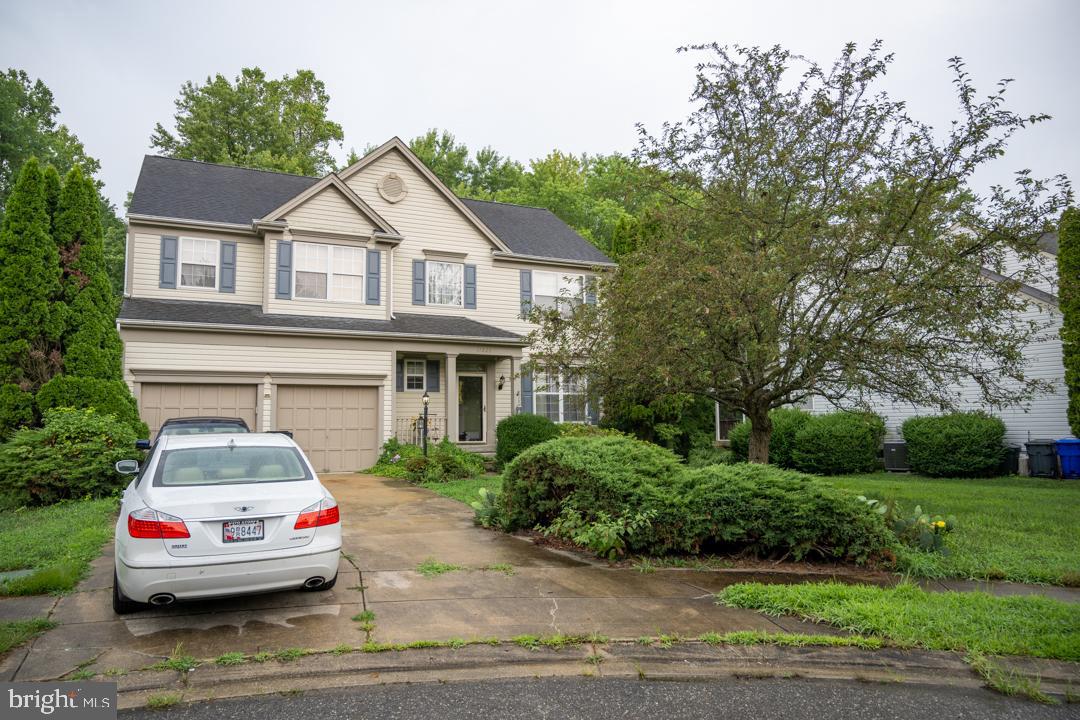 4 BED, 2.5 BATH COLONIAL WITH 2 STORY FOYER, LV/DN COMBO, EI KITCHEN W/ISLAND & OPEN TO FMRM W/FP, ENJOY THE DECK WHICH BACKS TO WOODS, FULL BSMT W/RI, 2 CAR GAR W/OPENERS. MAIN BED HAS 2 WI CLOSETS & SUPER BA.
