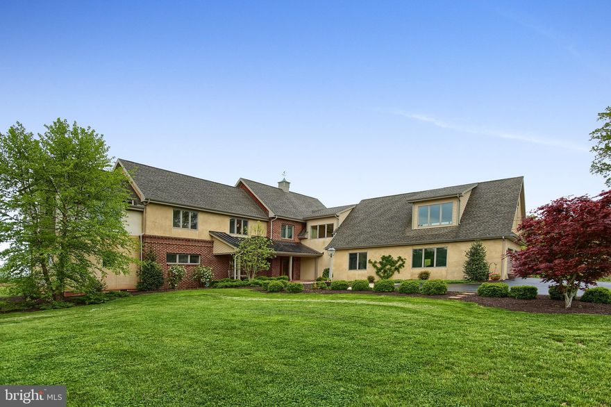 Cartref Farm is a magnificent 121-acre farm estate located in Newberry Township, York County, half-way between Harrisburg and York, Pennsylvania.   A paved drive enters the property to arrive at an attractive 7,000 SF home.  In perfect harmony with its surroundings, the main house overlooks a pond, in-ground swimming pool, historic bank barn, a stream, acres of pastures, and a 1,400 SF caretaker's house.   FARMSTEAD STYLE WITH 21ST-CENTURY LUXURY  - Built in 2012, the main residence has been designed to high standards. The interior is characterized by warm and inviting living spaces with classic architectural elements, such as 10-foot-high ceilings, interior brick, reclaimed oak hardwood flooring, and cherry kitchen cabinetry.   The residence offers ample opportunities for grand-scale entertaining indoors and out, on the screened-in porch or outdoor patio that overlooks 10 acres of woodland.   LIVING AND ENTERTAINING SPACES:  FARMHOUSE FEEL WITH ELEGANCE - Visitors are welcomed warmly into the home on the covered full brick front porch.   Once inside, the brick interior walls bring a sturdy farmhouse feeling.   The two-story great room is graced with a floor-to-ceiling native stone fireplace, soffit lighting, large windows overlooking the pastures and woods and expansive space.  Adorned with oak hardwood flooring reclaimed from a barn in York County, the great room transitions seamlessly to the double island kitchen.   The former is warmed by a wood fireplace, while the latter has large double islands and a walk-in pantry.  Complementing the main level is a music room or study with an exquisite ceiling and custom cabinetry, a three season screened-in porch, and a luxurious master suite.    RETREAT TO PRIVATE QUARTERS  - The main level includes a laundry room, two powder rooms, and a mud-room with access to a covered porch and oversized three car garage.   Upstairs, the spaciousness continues with four bedrooms, each with a full bath, a 5th bedroom/children's study/play room, laundry room, an unfinished bonus room and abundant storage.  The lower level basement is unfinished but includes Bilco door access to the outside.   GROUNDS FOR RELAXATION AND ENJOYMENT OF NATURE  -  A 1/4 mile driveway assures privacy and introduces this beautiful property.   Set amid more than 121 acres of picturesque grounds, Cartref Farm is a recreational idyll. The spring-fed pond is stocked with fish.   Two streams traverse the length and width of the property and approximately 10 acres of woods provide a beautiful natural setting.   The 20x40 inground salt water pool features an enclosed pump house and pool house with changing room.    THE GENTLEMAN FARMER OR EQUESTRIANS DREAM -  Cartref Farms grounds are arrayed with a host of amenities designed for the gentleman farmer or equestrian.  The recently renovated bank barn includes 4 stalls and ample storage for farm equipment, tools, hay, feed and tack.  The barn includes attached tractor stalls with automatic overhead doors and tanks for diesel fuel and gasoline.   EXTRAORDINARY AMENITIES - A superb array of amenities and features are found throughout the estate.   Supporting the property is a charming 1,400 SF guest house/caretaker's residence.  Other ancillary structures include a separate hay storage barn.  Designed for contemporary living, Cartref Farm is equipped with 21st-century amenities:  Highlights include radiant floor heating and designer lighting, geothermal heating and cooling, Rinnai instant hot water heaters (2), a 1,000 gallon in-ground propane tank, emergency generator, and security and fire alarm systems.   Property IS subdividable.  Only 5 miles away from the Capital City Airport, CXY, 16 miles to Harrisburg International Airport, MDT.  Easy access to the PA Turnpike.