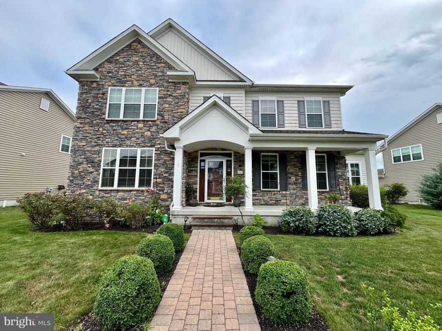 Quick settlement possible for this 5BR/4 Full & 1 Half Bath Colonial with 2-car garage. Built in 2019. Former builder model - loaded with original upgrades and more recent updates.  9 ft. ceilings throughout the main level. Kitchen with Quartz counter tops and ceramic tile backsplash. Tall 42 inch "mocha" cabinets and stainless appliances. Gas cook top and built in microwave hood vent. Double ovens. Stainless sink with disposal. Large center island with breakfast bar overhang adds workspace and additional cabinet storage. Four floor-to-ceiling pantry cabinets. A generous number of recessed lights as is the case with most rooms in the home. XL adjoining Sun/Day Room addition with cathedral ceiling adds to the feeling of openness. Formal Dining Room with chandelier. Formal Living Room with french doors and adjoining Full Bath with an oversized custom tiled shower. The Living Room has also been used as a first floor Guest Bedroom for those who have difficulty handling stairs. Family Room with gas fireplace with decorative mantel. Most rooms on the main level are detailed with extra wide crown molding (as is the upstairs landing and hallway).   Laundry Room with wall-to-wall built-in cabinets round out this level. Venture up the main stairway with finished oak treads to the 2nd floor landing. The Primary Bedroom Suite features a decorative recessed "tray" ceiling and walk-in closet. The private Primary Bath offers his & her vanities, an oversized shower with bench seat (ceramic tile surround), and a large soaking tub (no jets). There is a Hall Bath with double sink vanity as well as a full Jack & Jill Bath shared by two of the Bedrooms. All bathrooms have ceramic tile floors and tub surrounds as well as motion sensor activated vent fans.  All upstairs Bedrooms have ceiling fans. Discover even more living space on the finished Lower Level which consists or a large Den Area, Exercise Area, Half Bath, and a 5th Bedroom (or Home Office) complete with escape window (secondary egress).  A small unfinished storage area is also available.  Outside you will find a custom backyard Deck and front Porch. The mechanicals include a High Efficiency gas furnace and central AC system. Meridian Crossing offers a multitude of neighborhood amenities ranging from walking/bike trails and Playgrounds to the stately neighborhood Club House and Swimming Pool.   The Club House offers space for meetings, parties (kitchen available), and a fitness center. The monthly HOA fee gives you access to all of this and also includes lawn care.  Come out and see for yourself what #337 Sun Blvd. and Meridian Crossing have to offer.