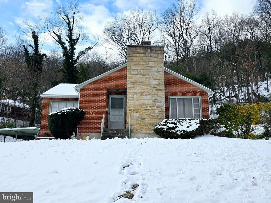 Great brick rancher just outside city limits of Cumberland which means no city taxes! 3 bedrooms, 1 full bathroom, living room with woodburning fireplace, formal dining room and adorable kitchen! This home has been lovingly cared for by the current owner for 47 years! Great views of the city from the front porch or side patio area! Detached carport and covered side patio area. Walk-in level from the driveway.