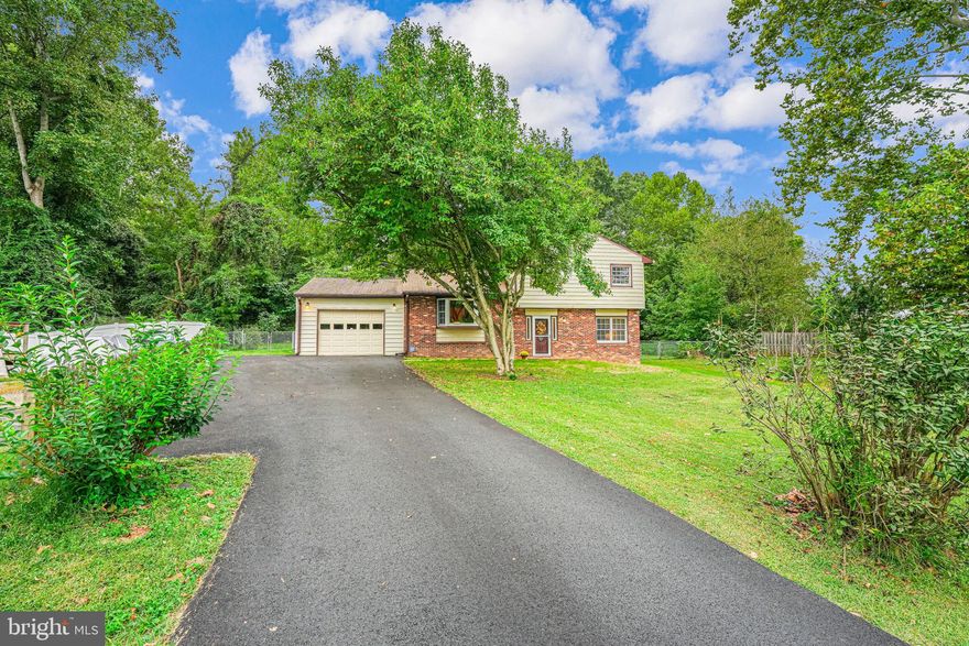 Move-in ready, split-level home, nestled at the end of a peaceful cul-de-sac. This well-maintained, one-owner home offers a blend of modern updates and classic charm. The kitchen was newly remodeled in December 2022 and features Stainless Steel Appliances, Corian Countertops, Soft-Close Cabinetry, and Under-Cabinet Lighting. Upgrades include an HVAC System installed in 2016, recently serviced, and a new Water Heater in 2022. The bathrooms have been updated, and the interior has been freshly painted. The lot backs to woods, with a fenced-in backyard, covered patio, and storage shed.  A storage room and shelving in the garage offer tons of storage space. Located just minutes from Spotsylvania Courthouse & The Market Square Pavilion. Call your favorite REALTOR® to schedule a tour TODAY!