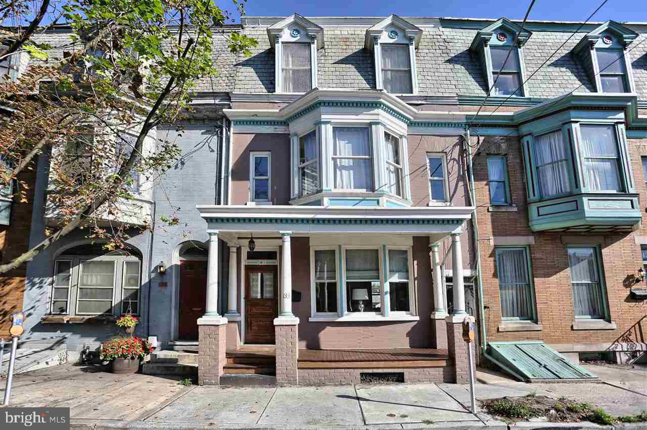 Gracious living in Carlisle's historic district close to Dickinson College. A classic historic house ready for the twenty-first century. Views of the roofs & spires of downtown Carlisle from the second floor bay window. Glimpse of the mountains from the screened-in 2nd floor balcony. Newer furnace and AC, gutters, insulation & more. Fully updated kitchen w/granite & beautiful center island. Private rear yard off covered patio, off-street parking & economical gas heat.