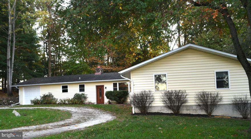4 Bedroom, 2 Bath Rancher in the Middle of a Farm with a rear Patio and a Deck. Freshly Painted, Some New Carpet, Circular Driveway