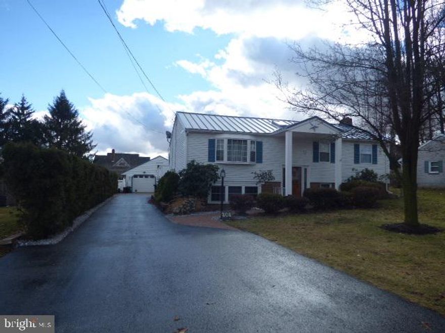 The weather might be a little iffy, but with warmer temps you'll want to be enjoying the decks, patios, and fenced backyard of this 4BR, 2BA split-foyer. Brick fireplace, natural gas grill, and two large fish ponds stocked with goldfish; make it the perfect place to relax. Garage lovers will delight in the 25x28 detached garage/workshop with 10x12 extension, 10x16 shed, pull-down attic storage, and woodstove. Home has great space and storage!