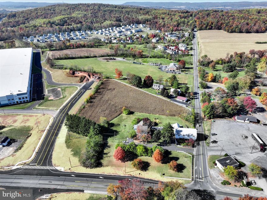 The New Hill Road is partially complete... and the Rte. 272 corners are curbed, paved and seeded... with even more decisions that will need to be made.
Corner Lot - Updated on lot lines & property with  Road Frontage on North Reading Road just off the PA Turnpike Entrance in Denver is a 5.4-acre redevelopment opportunity.  It Is General Commercial C-1 zoned, allowing a mixed set of uses including retail formats. Conveniently located along North Reading Road (16,000+ VPD), the site provides quick access to and from I-76 (29,000+ VPD).  An estimated 9.92 million visitors to Lancaster County directly spent $2.58 billion in 2023 (representing gains of 1.5% and 4.3% over 2022), creating a total tourism impact of $3.4 billion in the county.  This site a great development opportunity for any retailer to enter the Northern Lancaster County  market.