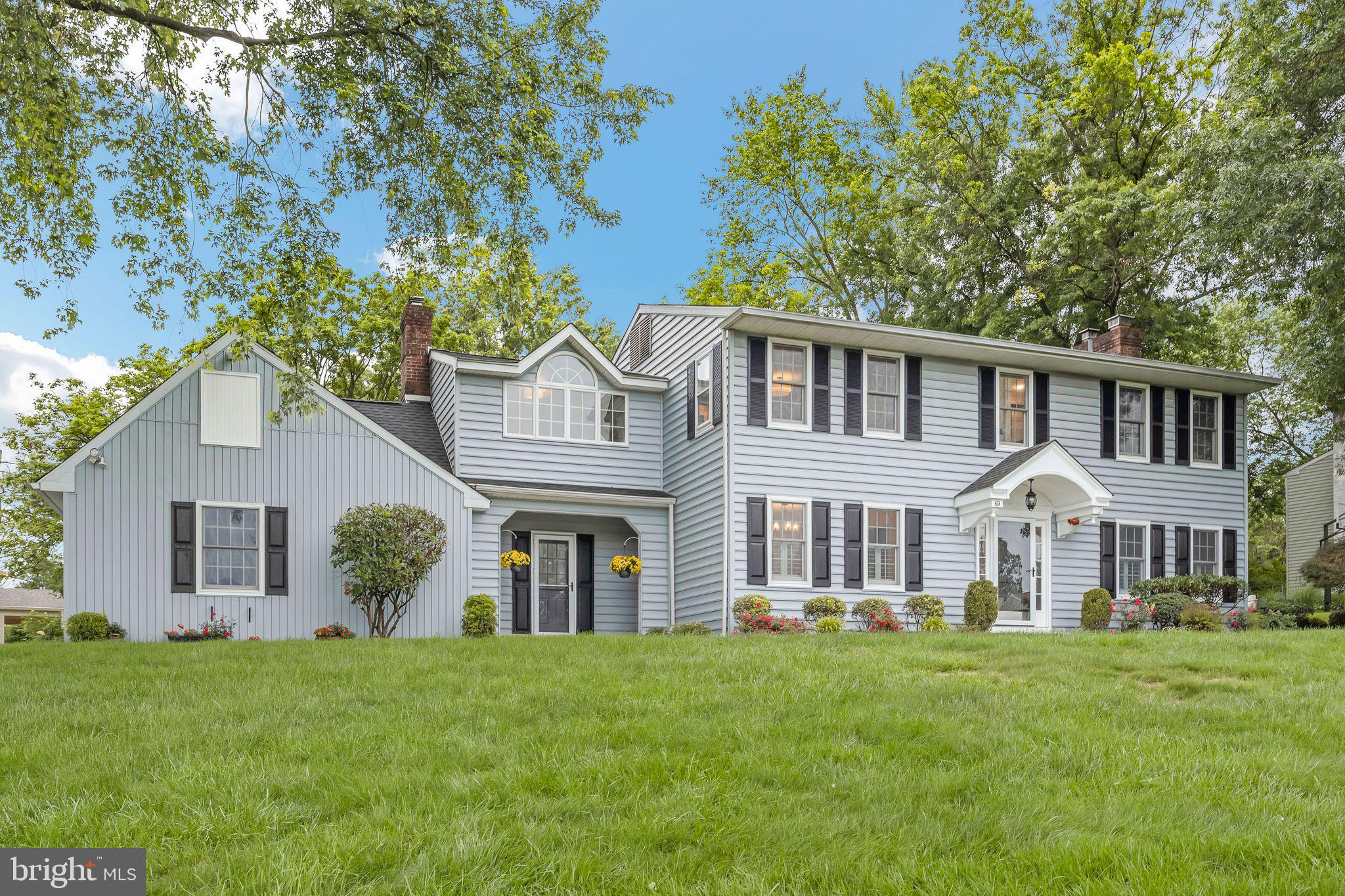 Welcome to 69 Hickory Lane, located in the sought-after Oxbow Meadows community in Central Bucks School District. This stately Colonial is situated on a large corner lot and features two convenient front entries, flanked by manicured flower beds. A charming portico greets guests and leads to the main foyer. Gleaming refinished hardwood floors extend through the dining room and into a cozy living room, complete with wood-burning fireplace. Both the living room and dining room are complimented by planation shutters and decorative chair-rail. New wood flooring has recently been installed in the kitchen, breakfast room, family room, main floor powder room and laundry room. The kitchen is enhanced by recently painted cabinets, stainless steel appliances, granite countertops and a peninsula that overlooks the breakfast room, with bay window. Just steps off the kitchen, an inviting family room features a gas fireplace with brick surround, recessed lighting, built-in bookshelves and a scenic view of the rear yard and access to the rear patio through sliding glass doors. Upstairs, recently refinished hardwood floors extend everywhere except for the hall bathroom. The primary bedroom suite features chair-rail, a large walk-in closet with a built-in organization system, a full bathroom with tile stall shower and extended vanity and an impressive office/sitting room with palladium window--filling the space with an abundance of natural light. There is also unfinished attic storage space accessible in the suite. Three additional bedrooms and well-appointed full bath can be found on the second level, as well. A partially finished basement offers versatile space suitable for a den, office, or playroom, complemented by a utility area for additional storage. Outside, the paver patio is ideal for your morning coffee or evenings spent entertaining friends and neighbors. Arborvitae have just been planted approximately 5 feet inside the property line and there a stake marking the rear property line from a recent survey. The property has an electric animal fence; current owners will include collar and receivers in sale. A convenient shed is accessible at the end of the driveway. Additional upgrades include new epoxy floors in the garage, a freshly paved driveway (which will be sealed before settlement), new paint throughout nearly the entire home, new electrical panel in 2025, a new roof in 2019, new light fixtures, new door hardware and new concrete walkway. Easy access to Routes 202 & 309, R5 SEPTA Train, PA Turnpike and only a few hundred yards to walking/biking trails & community parks. Hiking, kayaking, fishing and so much more can be found at Peace Valley Park/Lake Galena just a couple miles away. Schedule your appointment today!