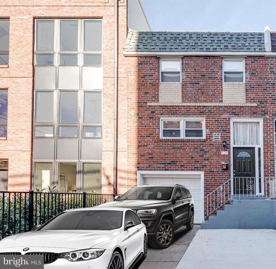 Rarely available and RENOVATED 3 BEDROOM NORTHERN LIBERTIES home with FOUR CAR parking, and an ENORMOUS PARK LIKE YARD. Drive right into your GARAGE  and have 3 additional spaces!
Enter into the most perfect LIVING and DINING area. All white Chef's kitchen, with amazing cabinet and counter space and a huge BREAKFAST BAR, all overlooking a gracious DINING AREA. A stunning metal staircase, acts as the perfect divider to your picture perfect LIVING AREA, with excellent natural SUNLIGHT. As you ascend to the second floor , you will find THREE wonderful bedrooms with huge closets and , an  elegant tile bath . The finished  lower level is the ideal work from home / gym area, with it's own tile bath, as well. This must see residence,  is located just minutes from some of NORTHERN LIBERTIES most well know dining such as, Cafe La Maude, &Jerry's Bar. Also just 10 minutes or less, to Jefferson, Pennsylvania and Cooper Hospitals .