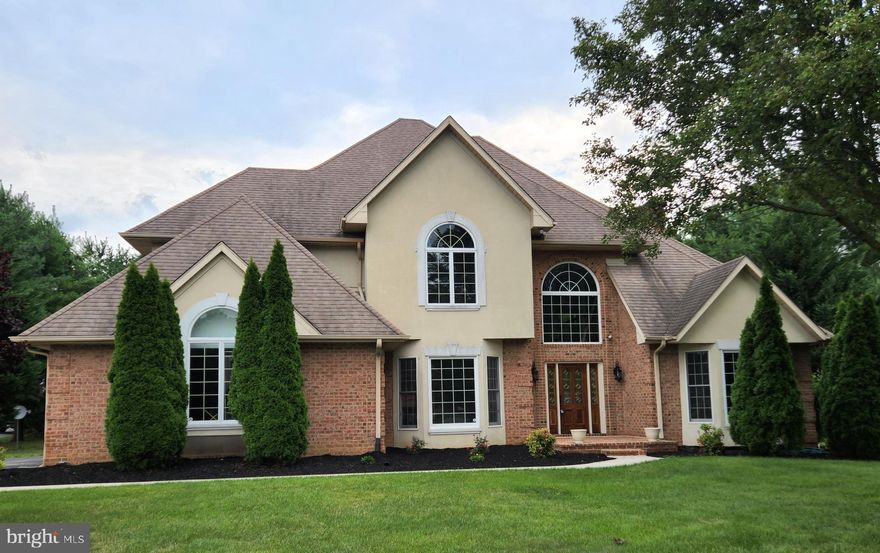 This 3,600+ Sq Ft Traditional Style Home  Has A Brick Exterior With Stucco & Keystone Accents, A 2 Story Foyer With Arched Fixed Panel Window That Illuminates The Foyer Area, A  Formal Living Room/Home Office With Bay Window, 4 Generous Size Bedrooms, Primary Bedroom Has Tray Ceiling, 2nd Bedroom Has A Vaulted Ceiling, 2.5 Baths Have Been Beautifully Updated: New Paint From The Finished Basement To The 2nd Floor Bedrooms, New Door Hardware, Remote Control Ceiling Fans & LED Designer Lighting, Primary Bathroom Renovated With New Vanity & Double Wave Bowl Cultured Marble Top & Faucets, Ceramic Shower, Glass Sliding Shower Door, Fabulous Double Slipper Soaking Tub And Ceramic Floor. New Kitchen Cabinets-Slow Close Doors/Drawers With Custom Hardware, 6' Island, Granite Countertops, 60/40 Double Stainless Steel Sink, Garbage Disposal, Ceramic Flooring,  & New LG Stainless  Steel Appliances.  Large Family Room Off The Kitchen Dining Area With Brick Fireplace /Wood Stove Insert,  Formal Dining Room With Bay Window, Crown/Picture Frame Molding, Chair Rail, 1,000+ Sq Ft Lower Level Has New Paint & Carpet In A Large Finished Rec Room/Game Room/Media Room, Separate Finished Room For An Office,/Playroom, & 2 Unfinished Rooms, One With The Furnace & 2 New 40 Gallon Hot Water Heaters Plus Great Spaces For Storage.  Furnace & CAC Installed June 2020. Roof Approximately 15 Years. Driveway depressions, cleaned out/leveled and entire driveway resurfaced with 2" of compacted Asphalt!  Located in a Subdivision of Fine Homes In The Rural Community of Washington County MD, Yet It Is Convenient To Many Desired Destinations, for Work & Recreation, East/West, North/South Due to I-70 & I-81 Interstate Highways. Minutes To Meritus Medical Center, Hagerstown Community College, Black Rock Golf Course, County Parks, Restaurants and Shopping. Approximately An Hour & 15 Minutes Drive To Washington DC & Baltimore MD.