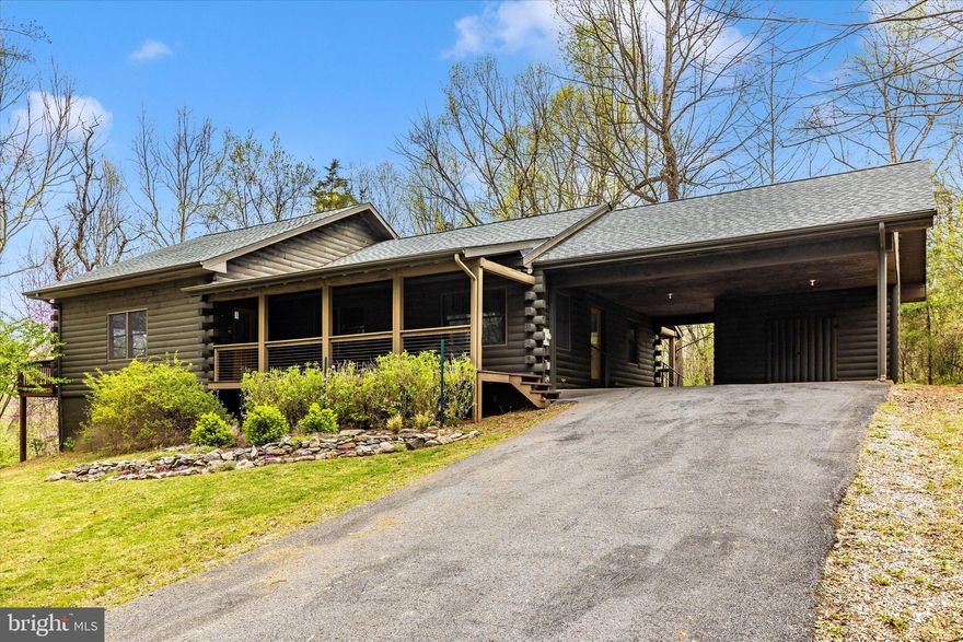 Multiple offers received. 
Welcome to your peaceful retreat on the Potomac River. This charming log cabin sits on over three private acres, offering a secluded setting perfect for nature lovers. Over the past several years, the home has been thoughtfully updated, blending rustic charm with modern comfort.

In 2016, the top floor was fully remodeled with new luxury vinyl plank flooring, a custom kitchen featuring high-end appliances, a farmhouse sink, custom cabinetry, and open barnwood shelving. Both bathrooms were upgraded, including a beautifully tiled master shower and a solid wood vanity with a Carrara marble top. The primary bedroom gained a walk-in closet and sliding barn doors crafted from reclaimed wood. Large picture windows were added to the great room, and the mudroom was enhanced with built-in storage. Lighting, fixtures, and insulation were also updated for improved comfort and efficiency.

A high-efficiency HVAC system was installed in 2017, along with a modern dark grey exterior stain and a custom front porch railing.

In 2020, three-quarters of the walkout basement were finished, adding a bedroom, ensuite bathroom, laundry room, new flooring, and lighting. Electrical upgrades followed in 2022, including a whole-house surge protector and generator hookup.

In 2024, a new well pump and an Atlas shingle roof with a transferable 20-year warranty were added.

This beautifully upgraded riverside home is offered below appraised value—a rare opportunity to own a private, turnkey getaway.