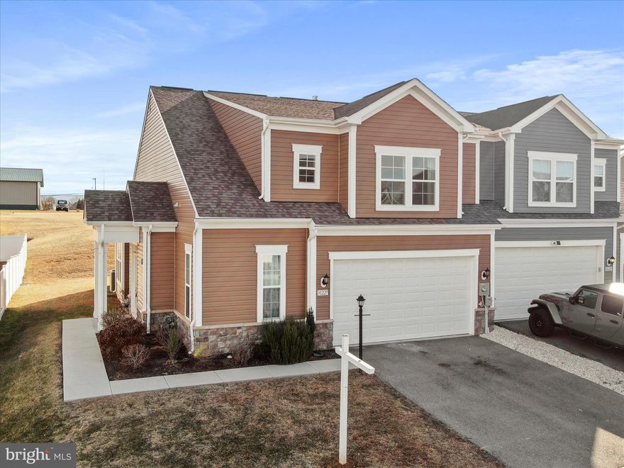 Beautiful like-new villa with over 2,300 sq. ft. of living space featuring 3 bedrooms, 2 full, and 1 half bathrooms. Just 5 years old and completely move in ready. No HOA and no city taxes. The gourmet kitchen has quartz counter tops, huge island, and stainless steel appliances. Spacious living room has cathedral ceiling, a cozy fireplace, and walks out to an open and expansive back yard that can easily be fenced in for the pups or the kids. Primary bedroom with huge walk in closet is conveniently located on the main level and has a private bathroom with double bowl sinks, walk-in shower, and soaking tub. Laundry on the main level with front loading washer and dryer included. The well designed and open concept layout features a second floor family room along with 2 huge bedrooms and a bonus storage area. Prime commuter location and close to everyday amenities. Beat the spring market rush and schedule your showing today!